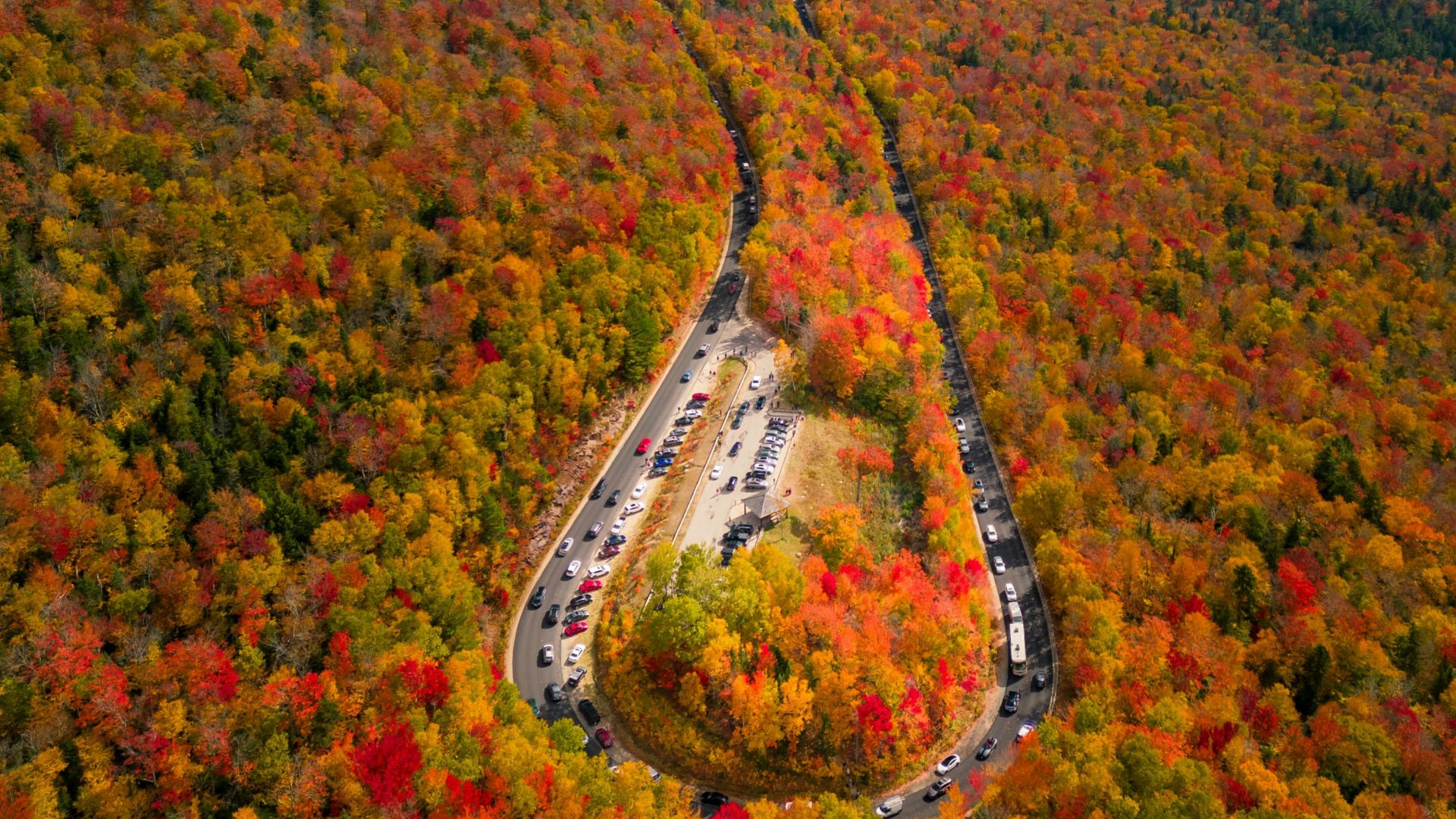 a winding road through a beautiful landscape