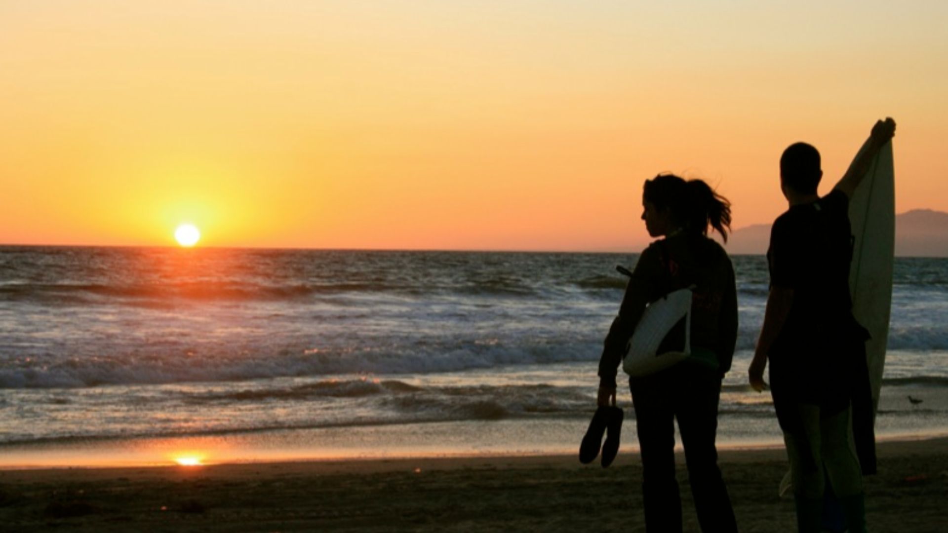 The sunset over Santa Monica Bay at Venice Beach park, Southern California