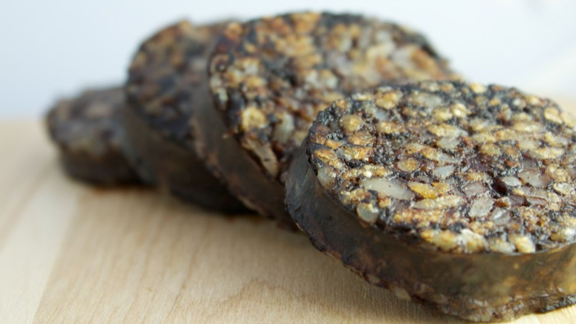 Fried slices of Burgalese black pudding