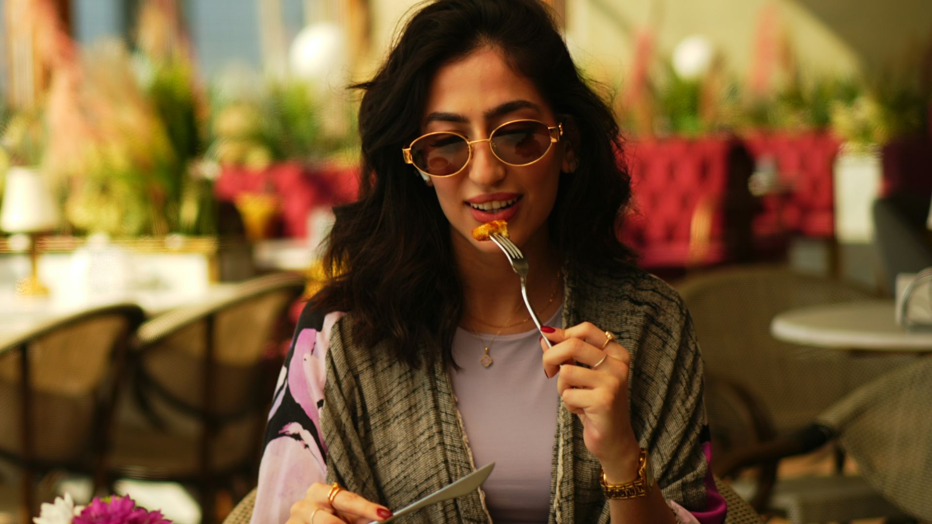 Woman eats dessert at a fancy restaurant
