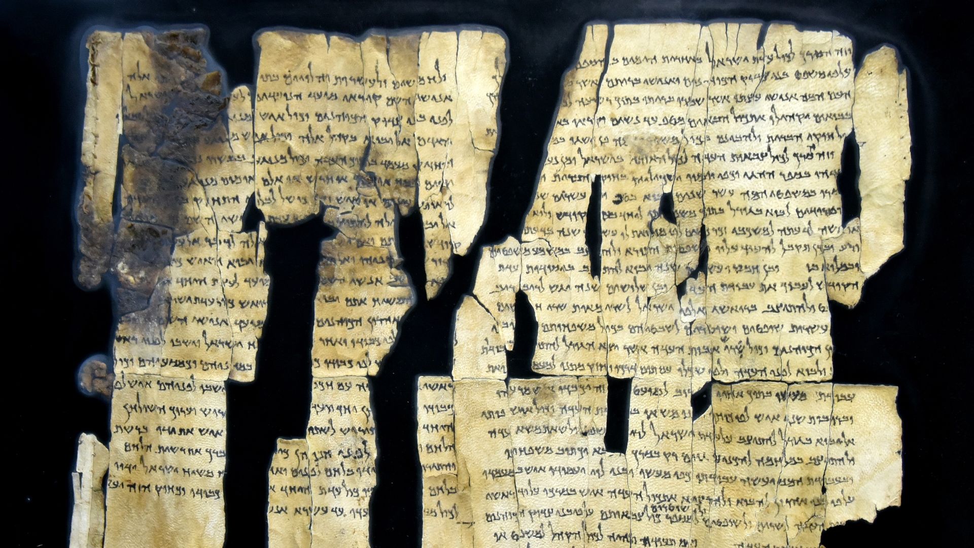 Dead Sea Scroll number 28a (1Q28a), from Qumran Cave 1; complete. From Qumran (Khirbet Qumran or Wadi Qumran), West Bank of the Jordan River, near the Dead Sea, modern-day State of Israel. On display at The Jordan Museum in Amman, the Hashemite Kingdom of