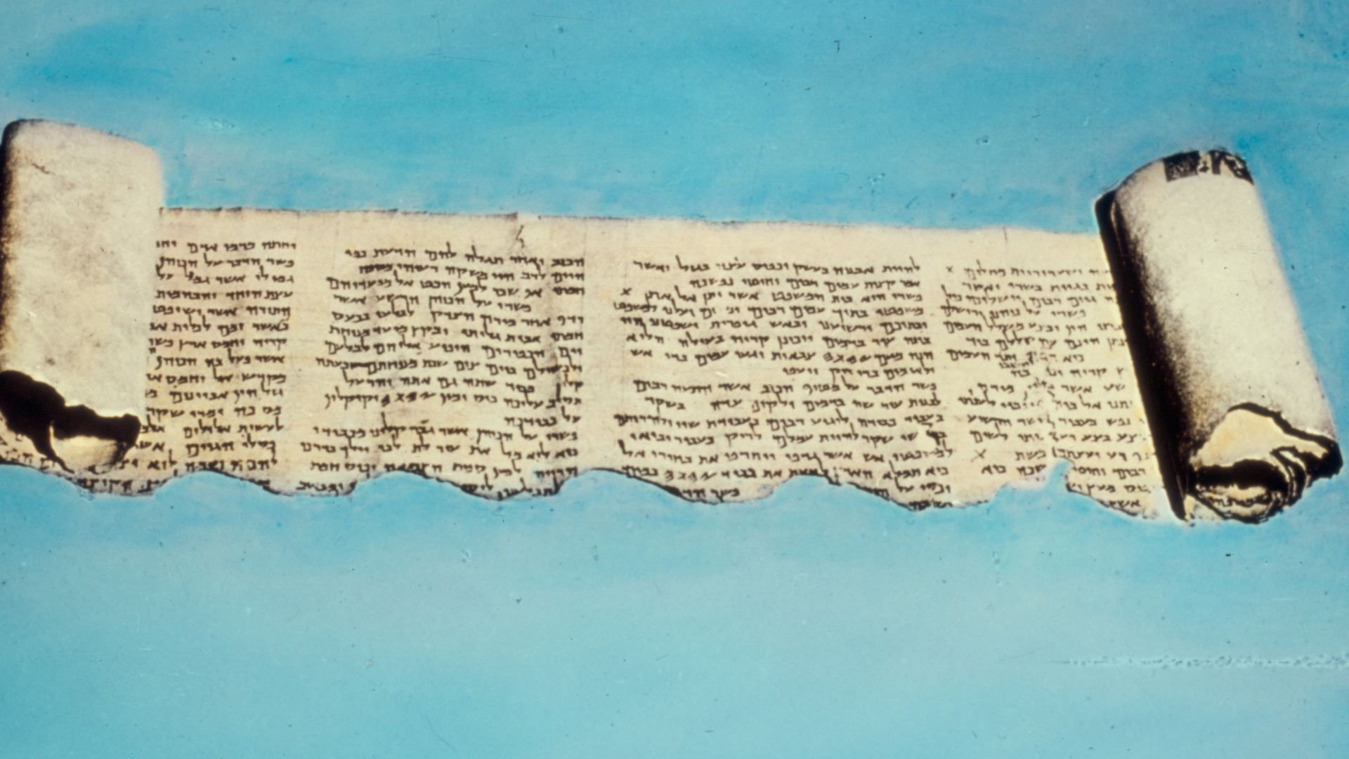 Title: Jericho and Dead Sea area and River Jordan. Qumran: Close-up of section of Dead Sea scroll from