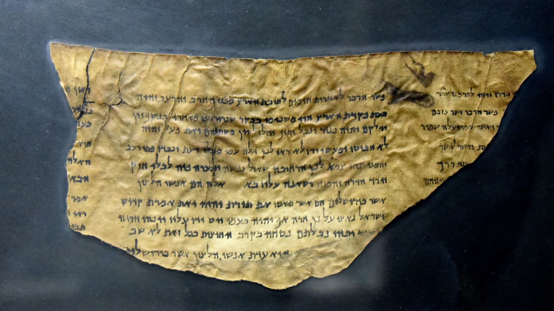 This is part of Dead Sea Scroll of Pesher Isaiah (4Q162), from Qumran Cave 4. From Qumran (Khirbet Qumran or Wadi Qumran), West Bank of the Jordan River, near the Dead Sea, modern-day State of Israel. The Jordan Museum, Amman, Jordan Hashimite Kingdom.