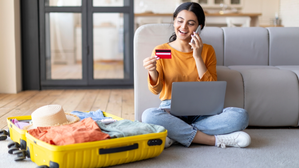 image of a happy woman on a laptop
