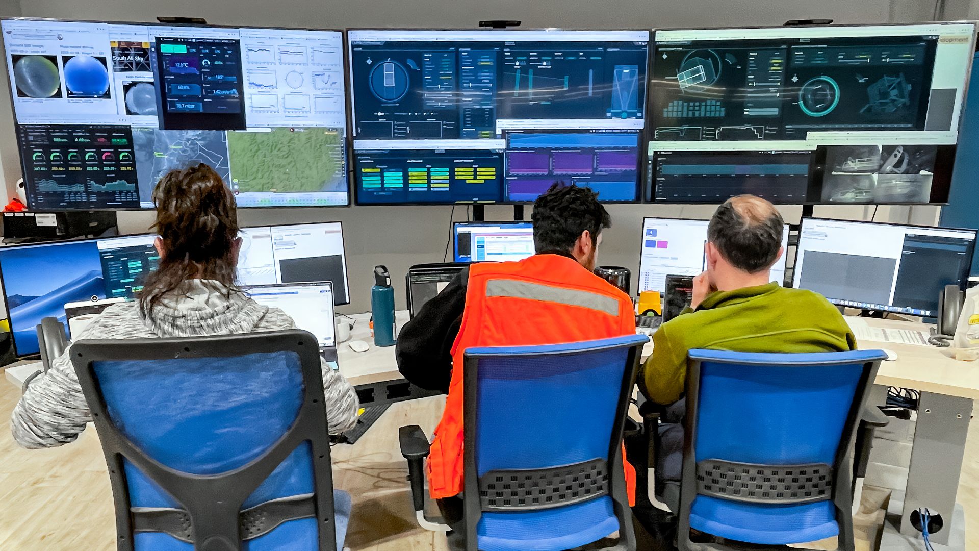 Technicians at NSF-DOE Vera C. Rubin Observatory work in the telescope's control room.