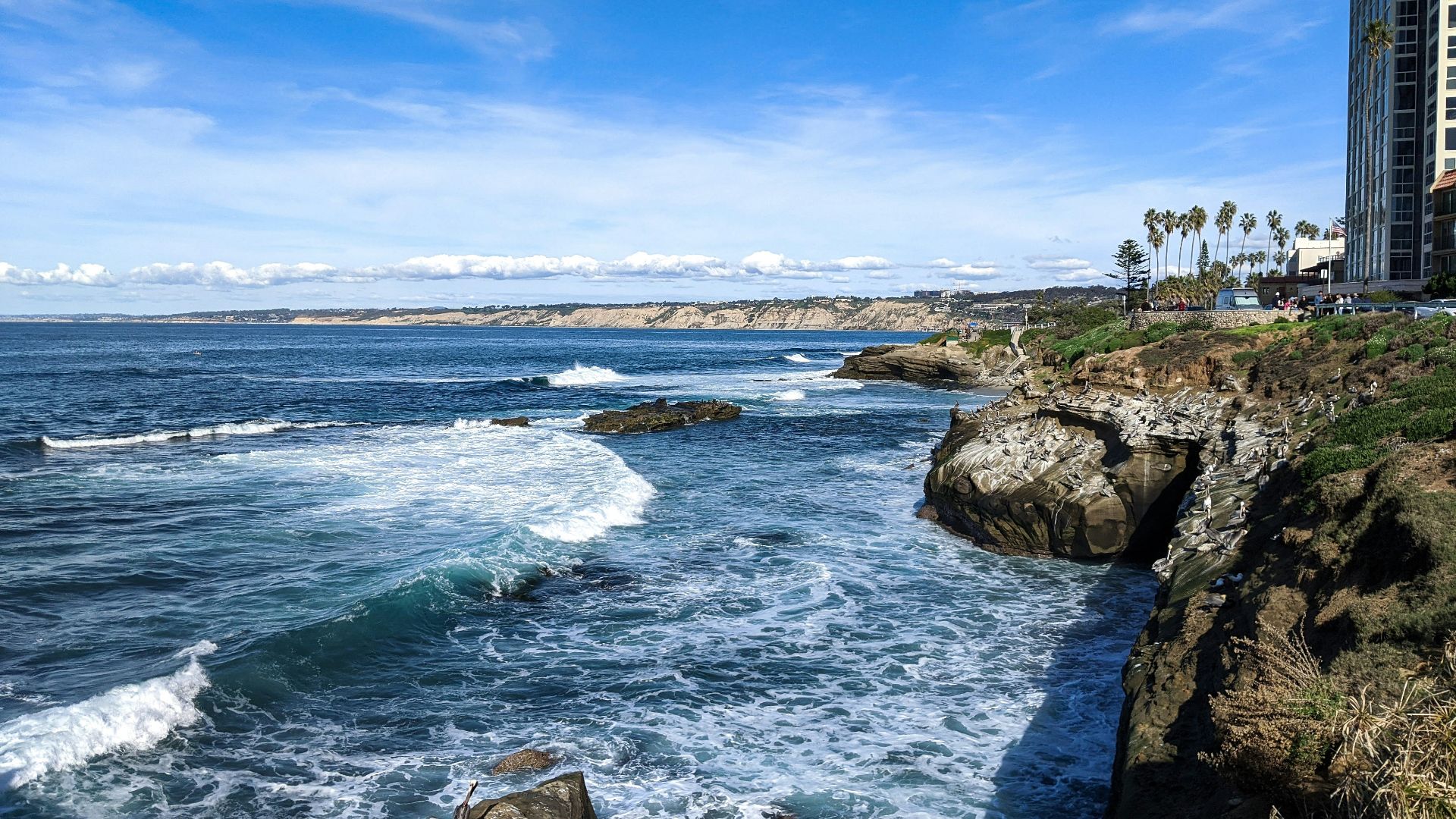 a view of the ocean from a cliff