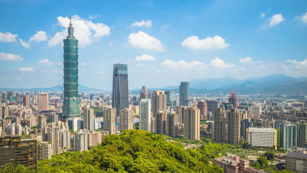 The image showcases a Vibrant urban scene of Taipei, Taiwan