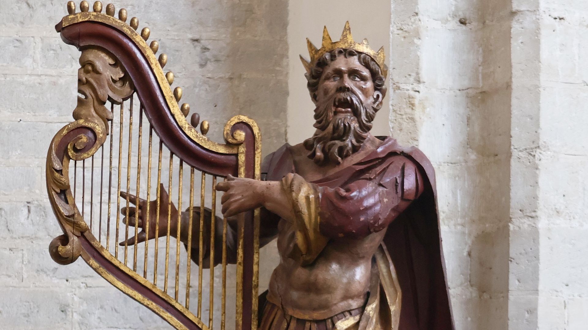 Statue of King David playing the harp in the Great Church of Breda