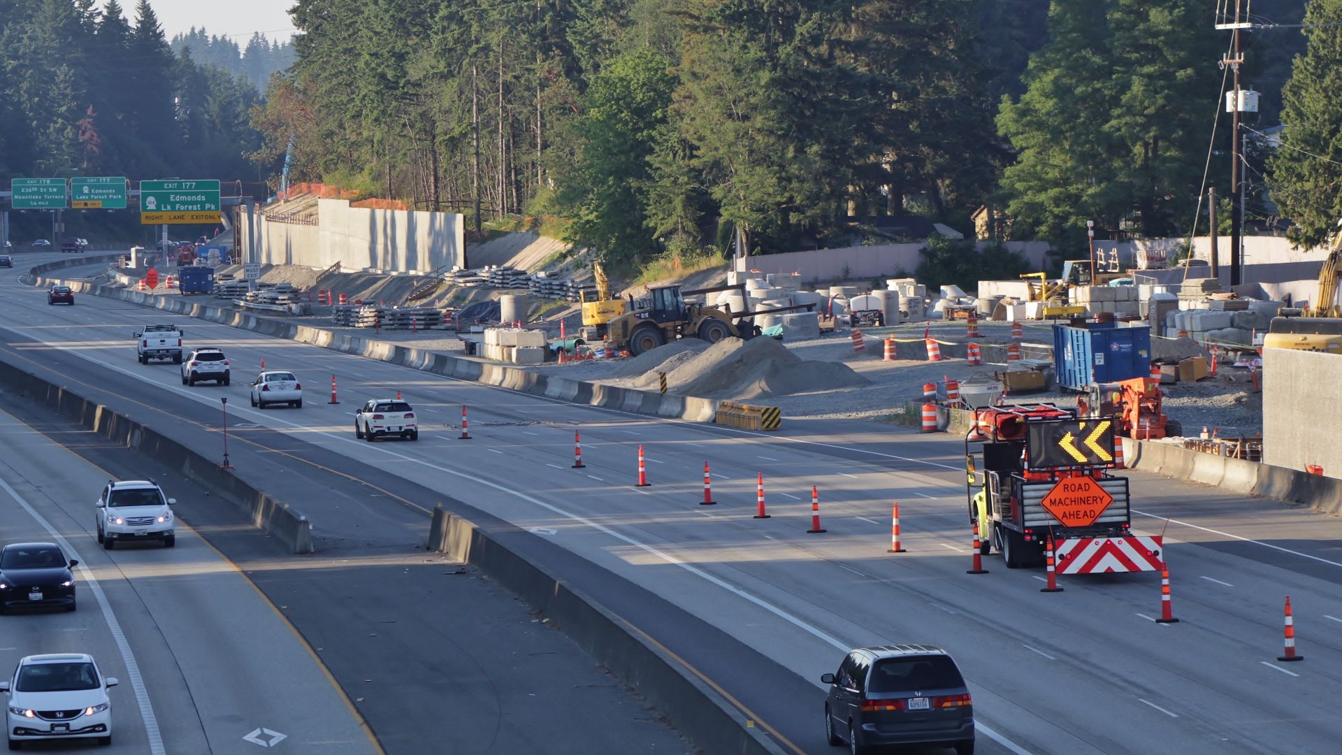 A section of buckled pavement on Interstate 5 in Shoreline, Washington under repair amid the 2021 Pacific Northwest heat wave, as seen from Northeast 185th Street.