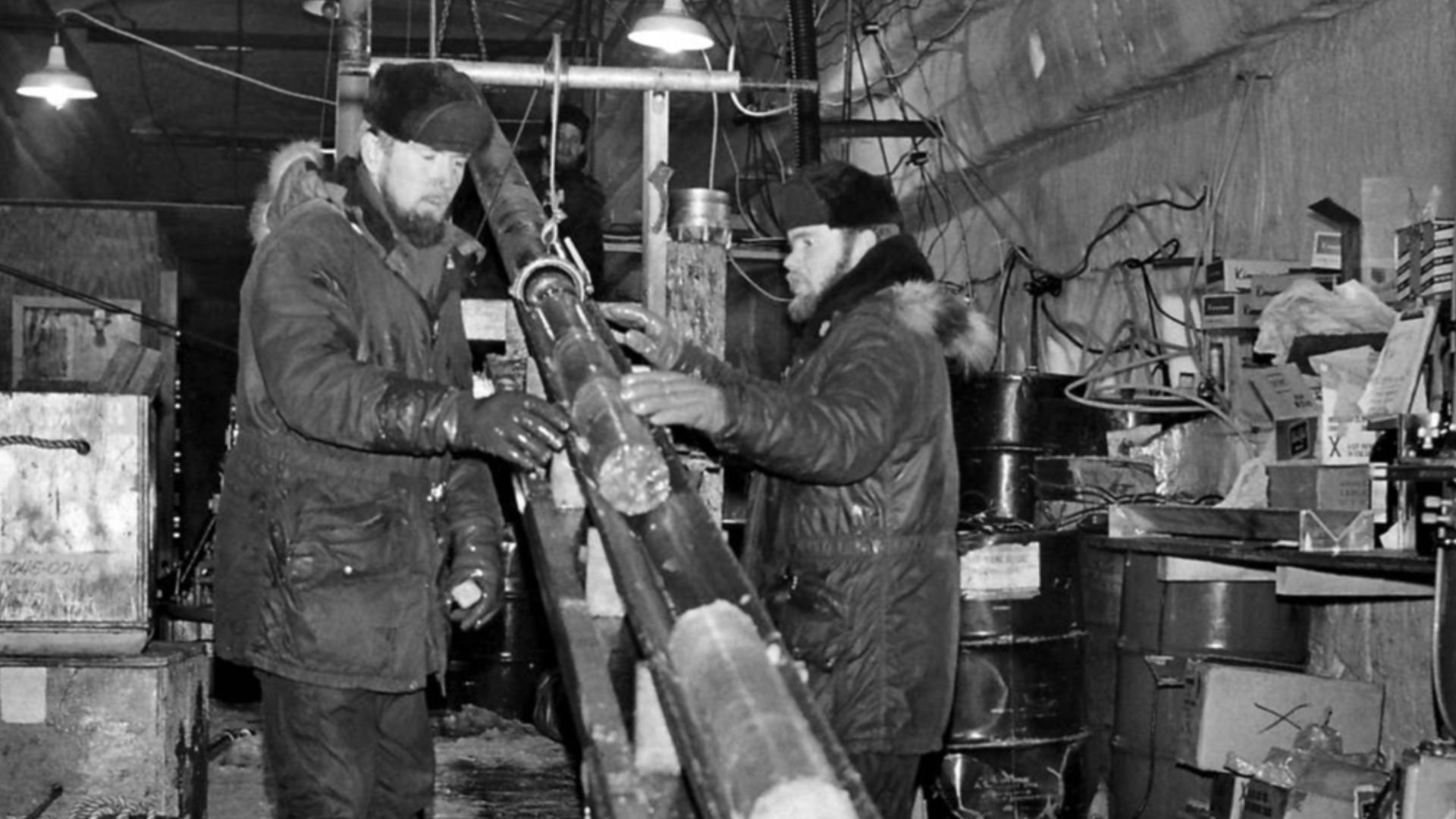 Engineers with the Cold Regions Research and Engineering Laboratory capture an ice core at Camp Century, Greenland. From 1961 to 1966, the research team, led by Lyle Hansen, analyzed ice from the bottom of the glacial sheet to study atmospheric conditions