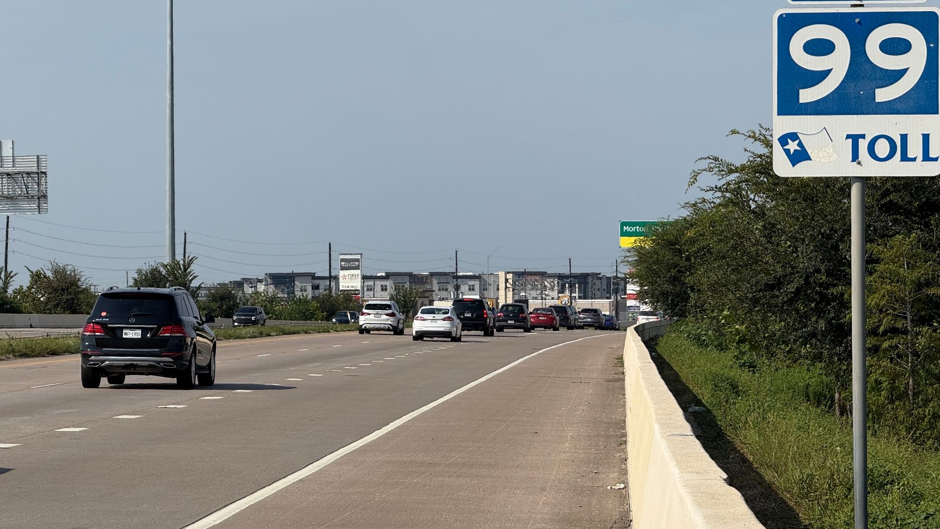 View north along Texas State Highway 99 (Grand Parkway) just north of its western interchange with Interstate 10 (Katy Freeway) in Houston, Harris County, Texas