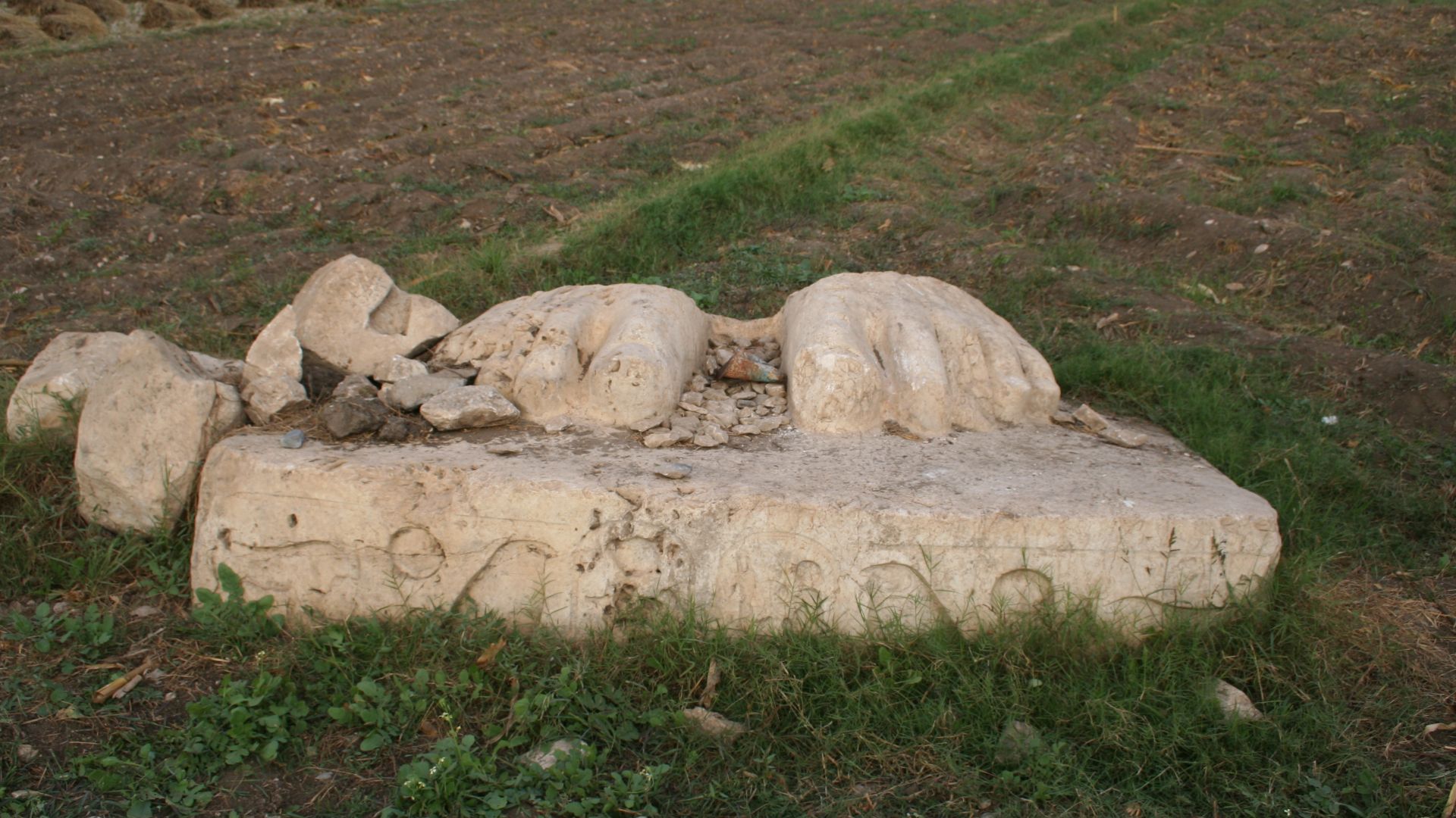 Feet of a colossal statue of Ramses II in Qantir