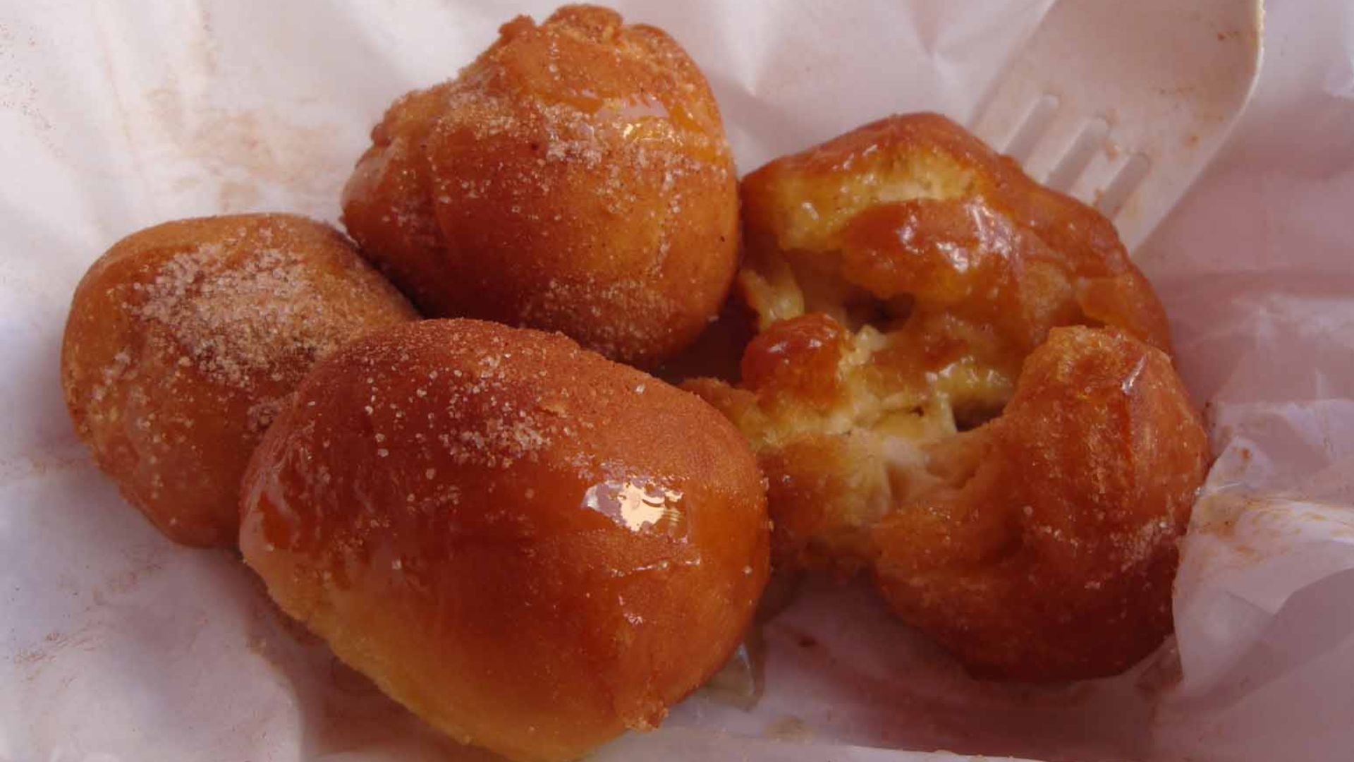 Deep-fried butter at State Fair of Texas, 2009

Original description: This was WAY better than I thought it would be.  Think a fresh donut hole, covered in honey and cinnamon/sugar.  With melted butter in the center.  Oh yeah.
