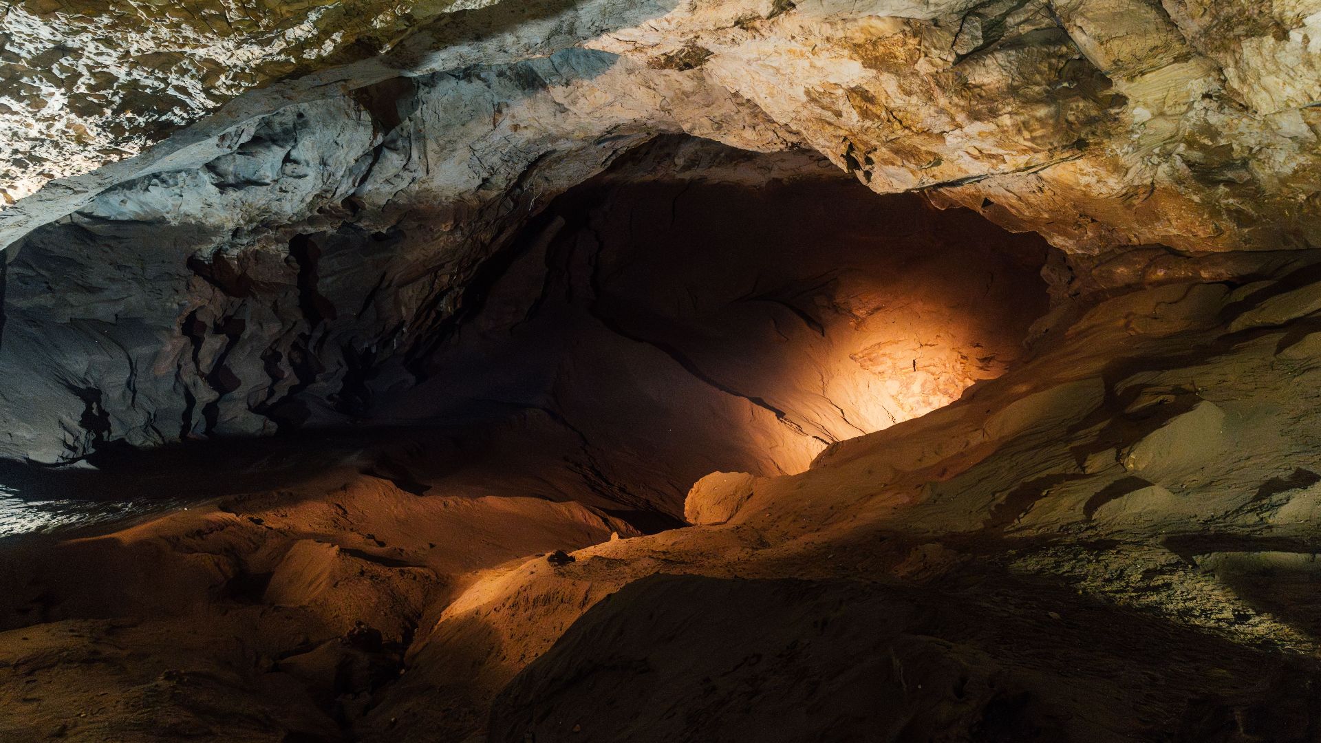 Explore the stunning rock formations inside a cave in New Athos, Abkhazia.