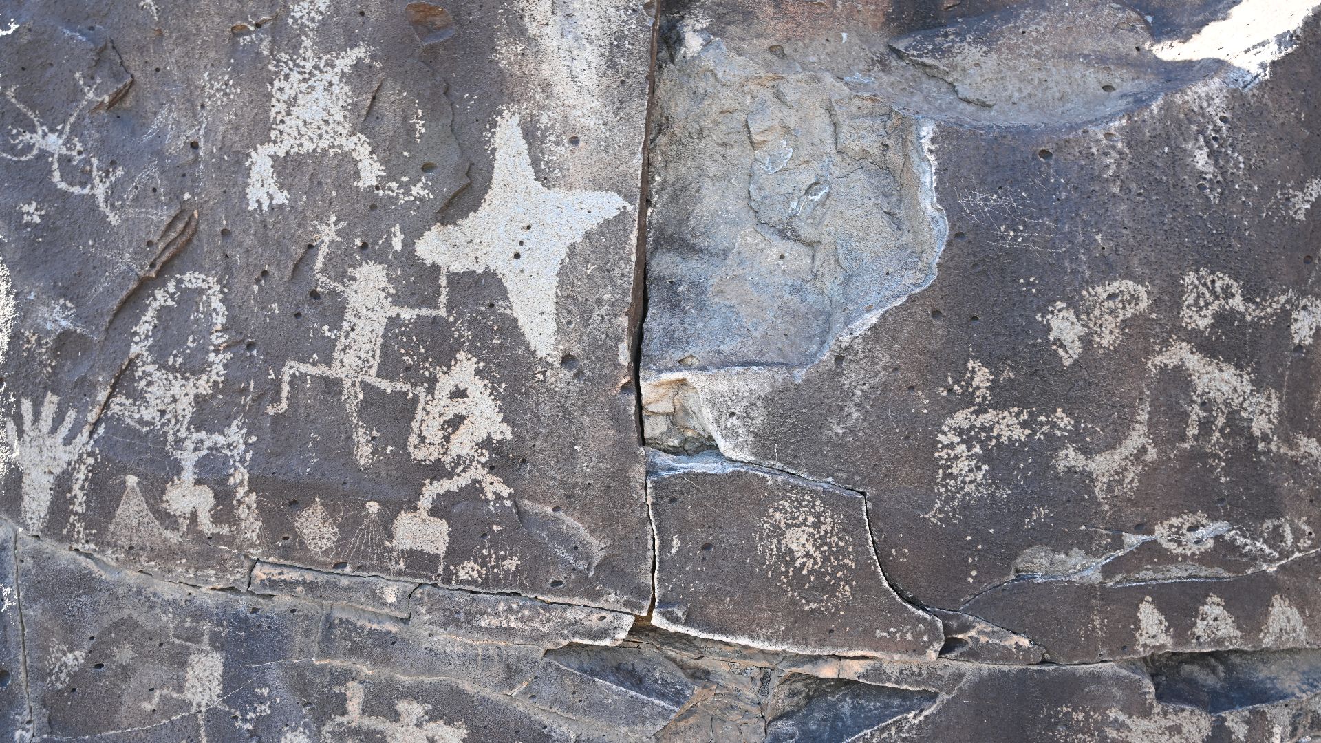 A closer look at some petroglyphs on a rock at La Cieneguilla Petroglyph site outside of La Cienega, New Mexico.