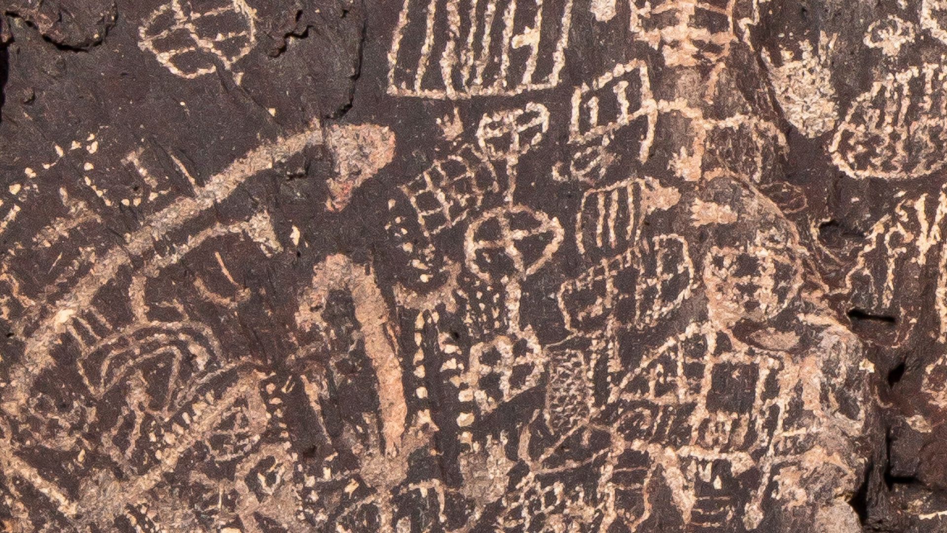 • Early native peoples carved designs into the face of rocks, cliffs, and cave walls. These carved designs are called petroglyphs.
• The petroglyphs on the Volcanic Tablelands are located on Bishop Tuff, volcanic rock with dark colored surface layer (pati