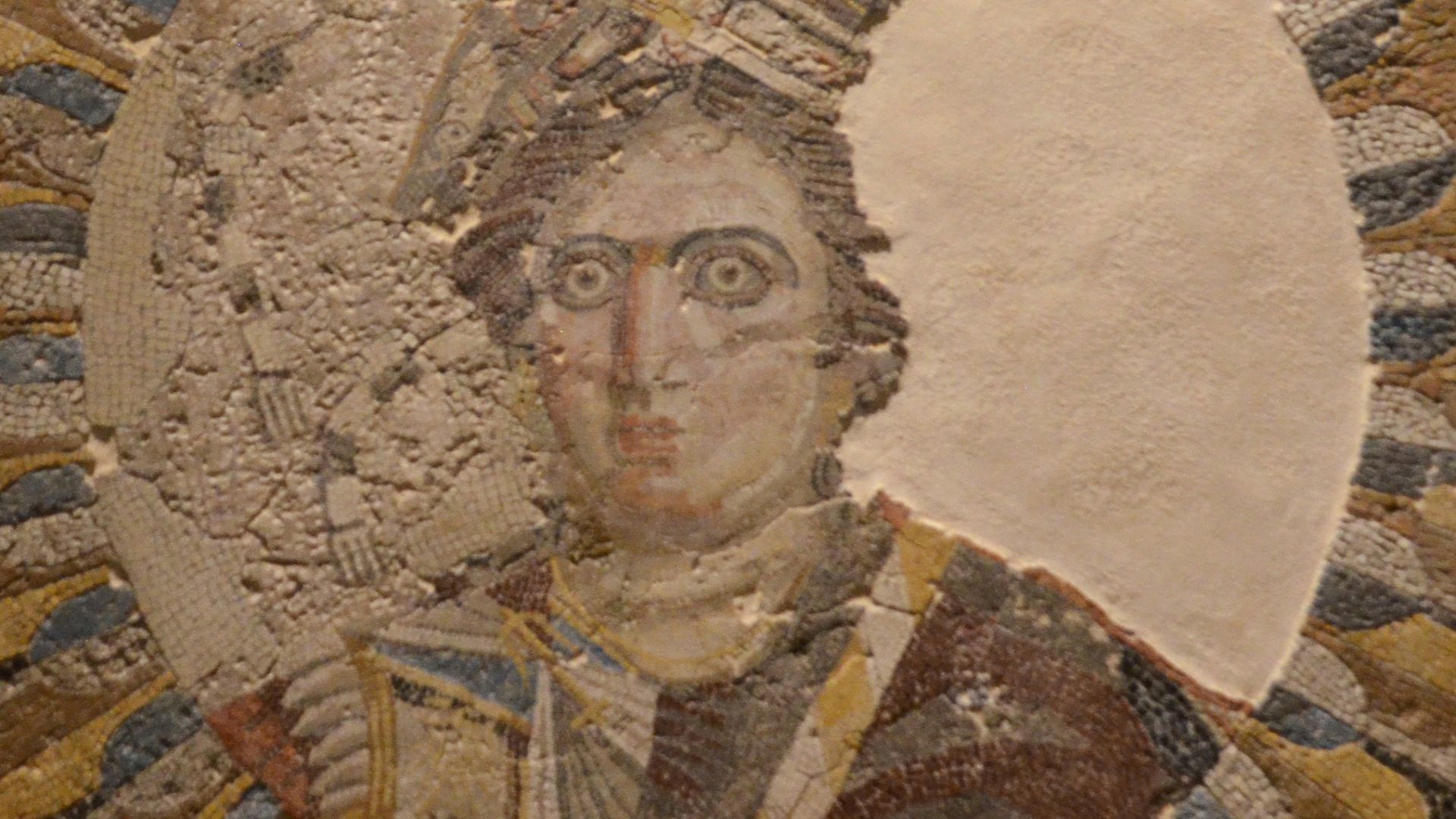 Mosaic portrait representing Queen Berenice II, wife of Ptolemy III, showing her with prow of warship on her head symbolizing the city of Alexandria, found at Thmuis, Ptolemaic period, Alexandria National Museum, Egypt