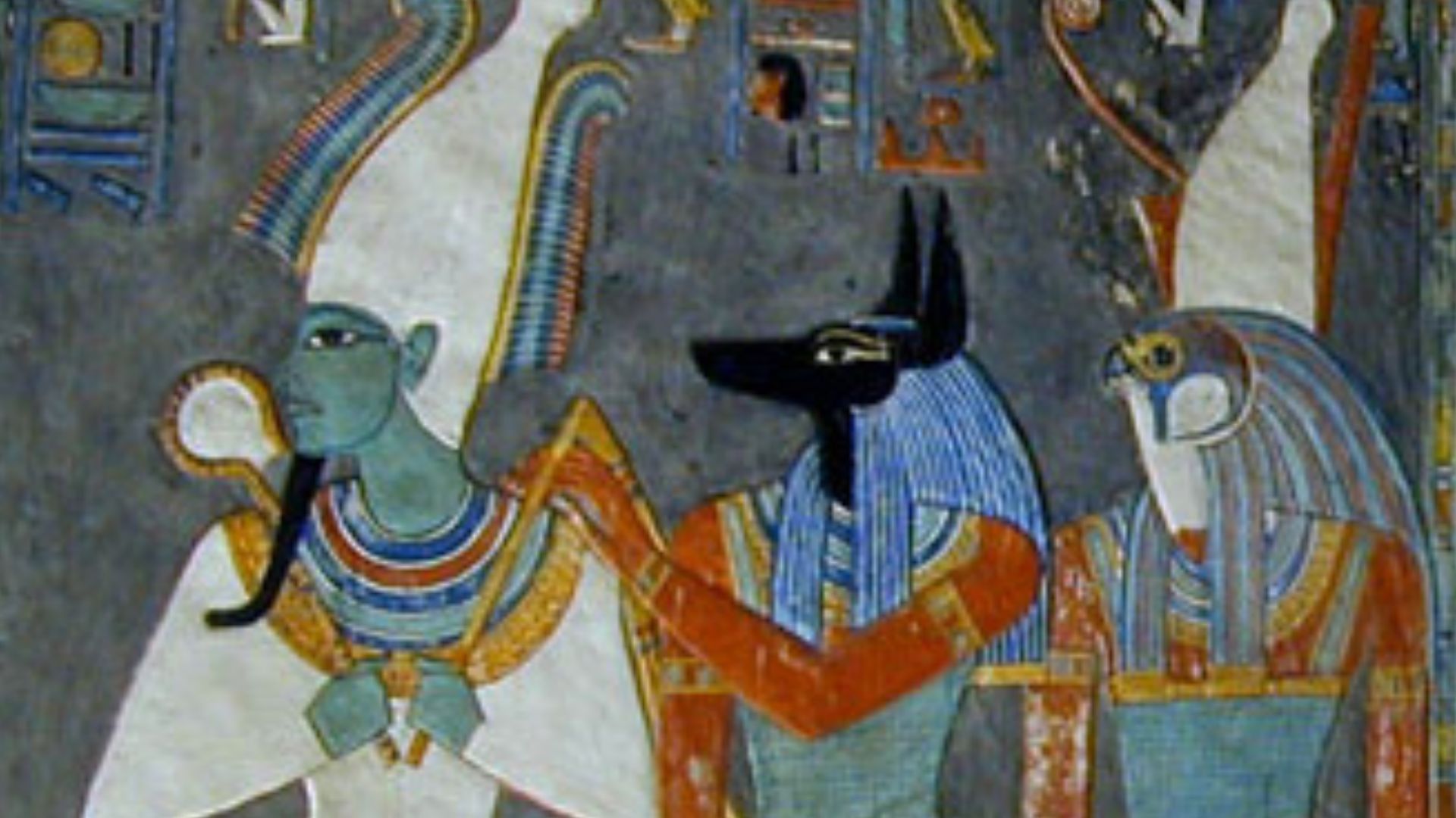Detail of the frieze of the wells in the tomb of Pharaoh Horemheb, showing the gods Osiris, Anubis, and Horus.