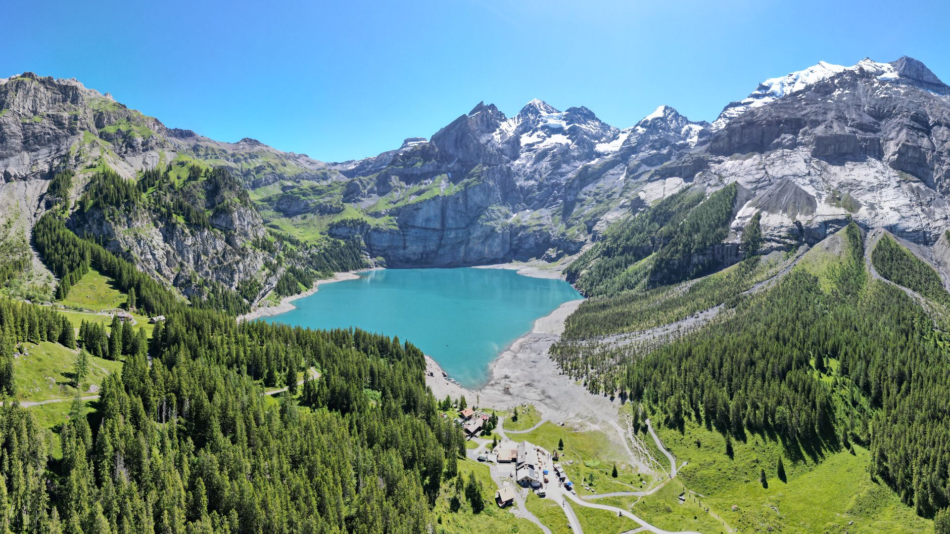 Oeschinen Lake (Oeschinensee) panorama from above 140622. A view to mountain Blüemlisalp-Rothorn, Bernese Alps.