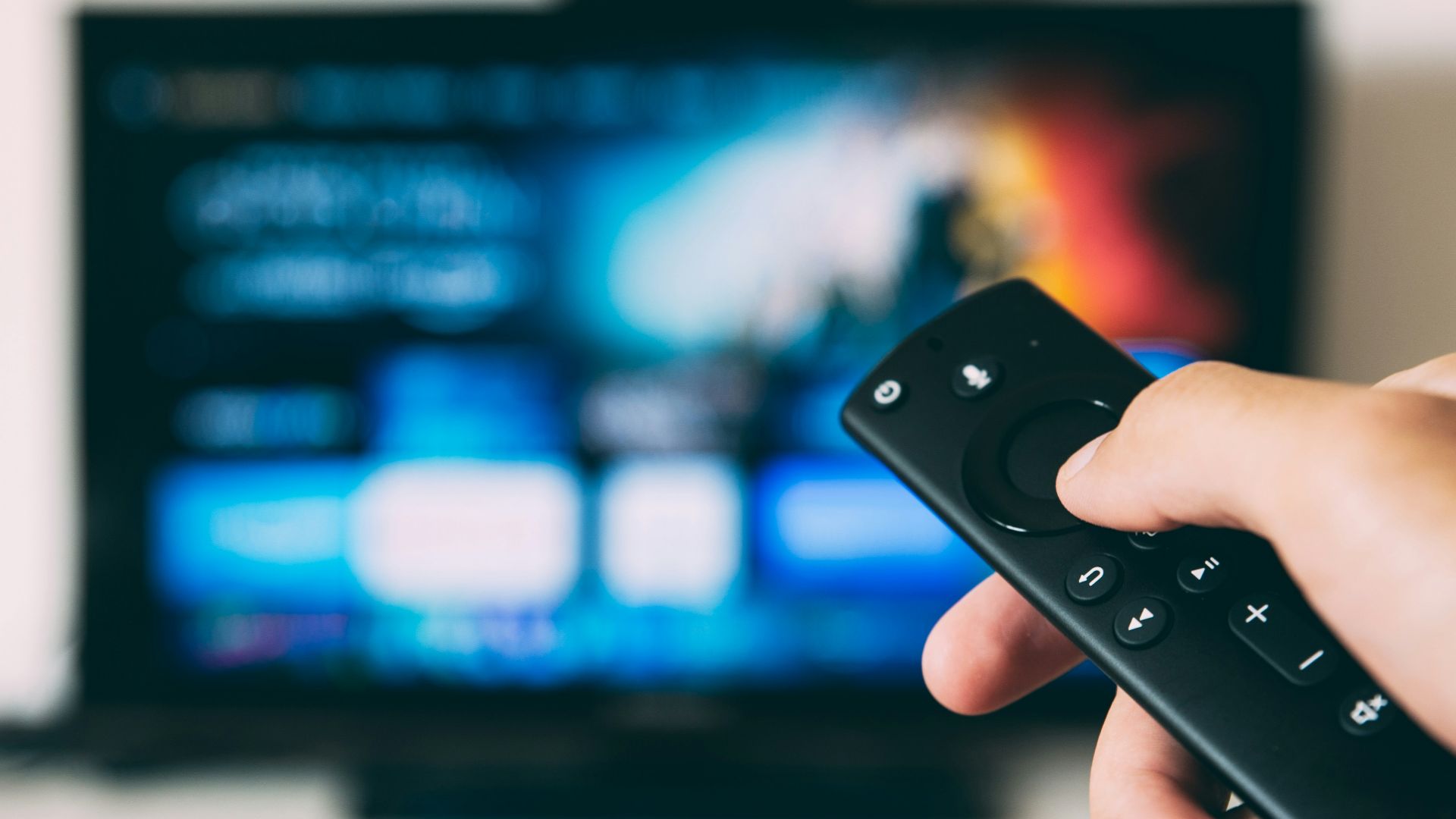 turned-on flat screen television