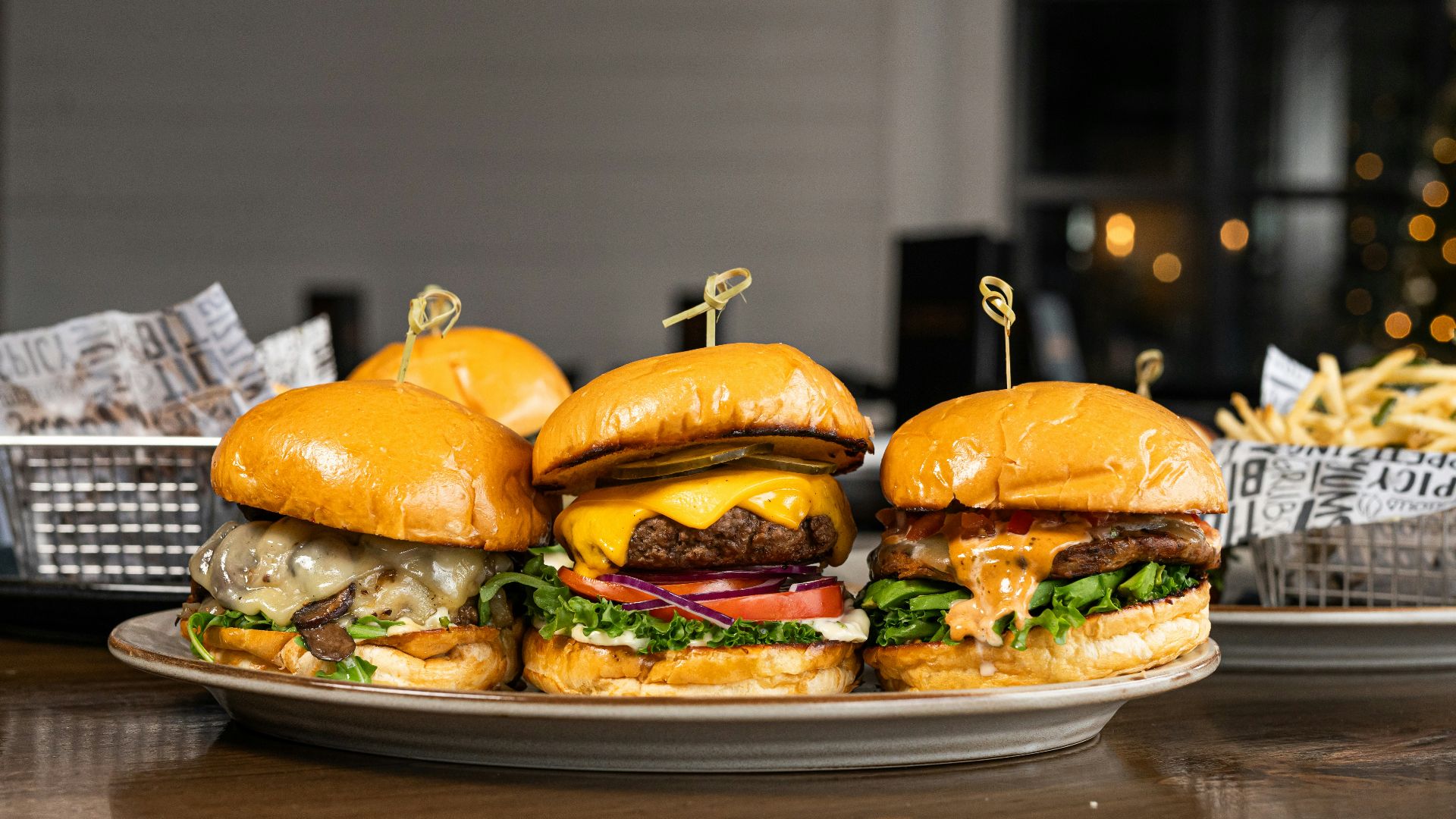 a plate of hamburgers on a table