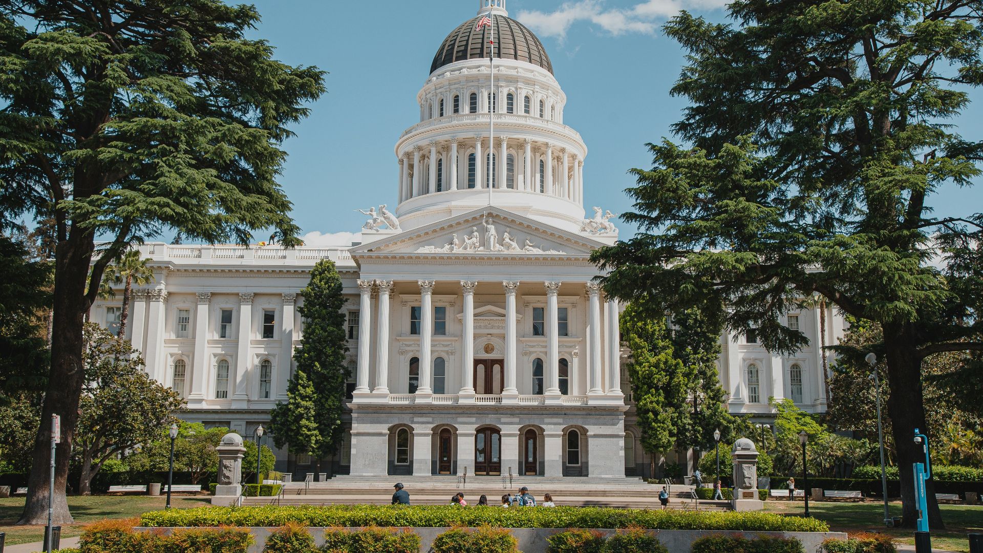 a large white building with a dome on top of it