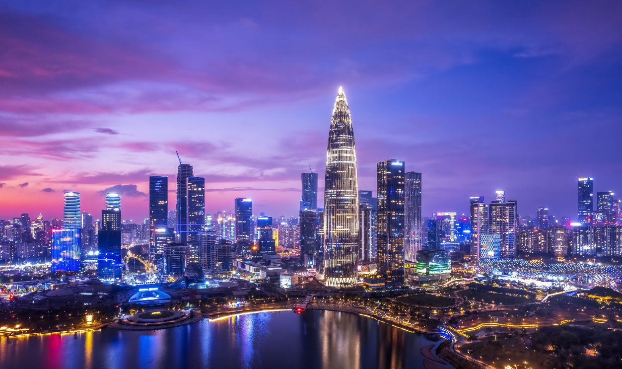 Stunning Night View of a Vibrant Urban Skyline with Towering Skyscrapers