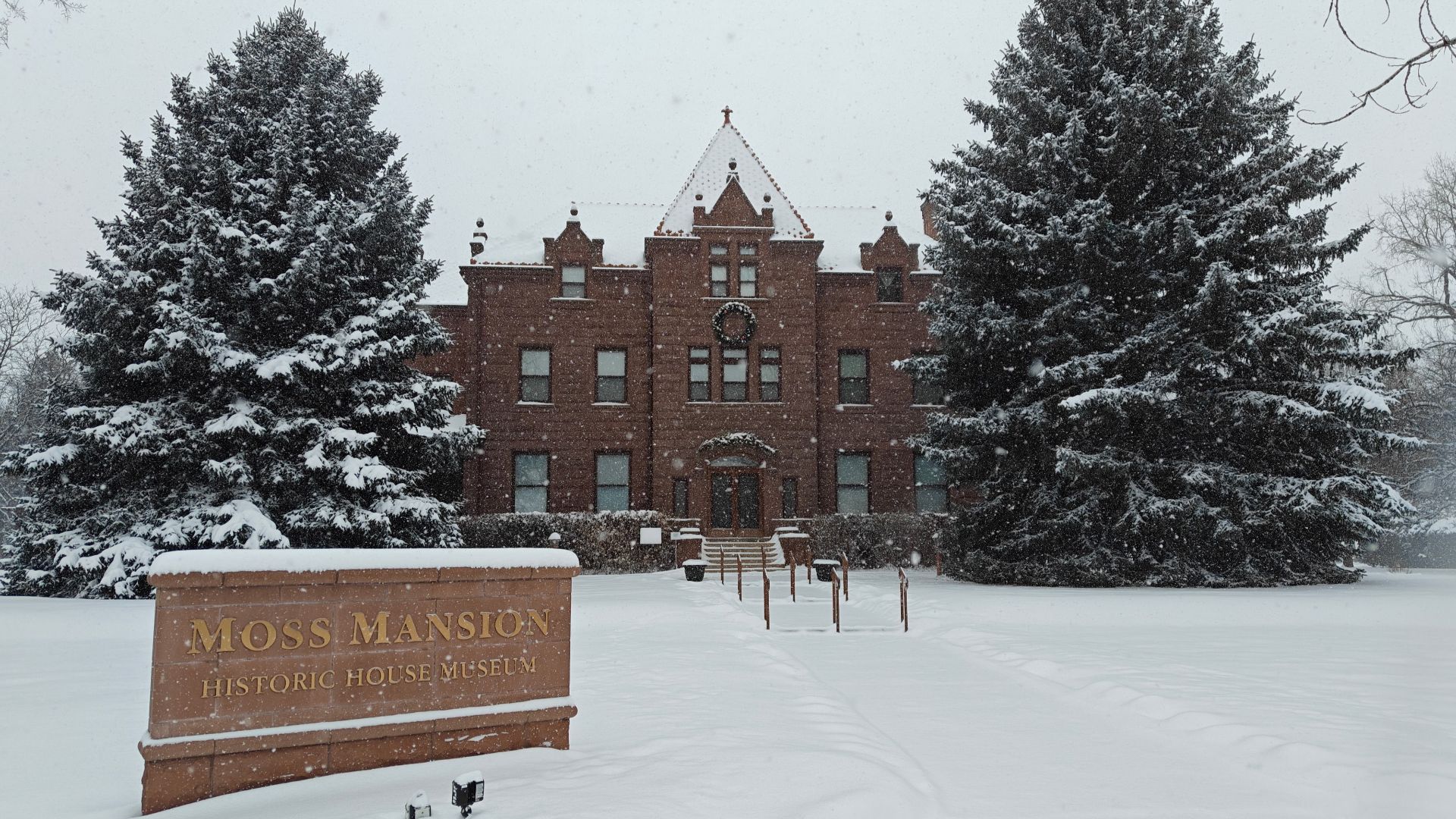 The exterior of the Moss Mansion in Billings, Montana, during a snowstorm.