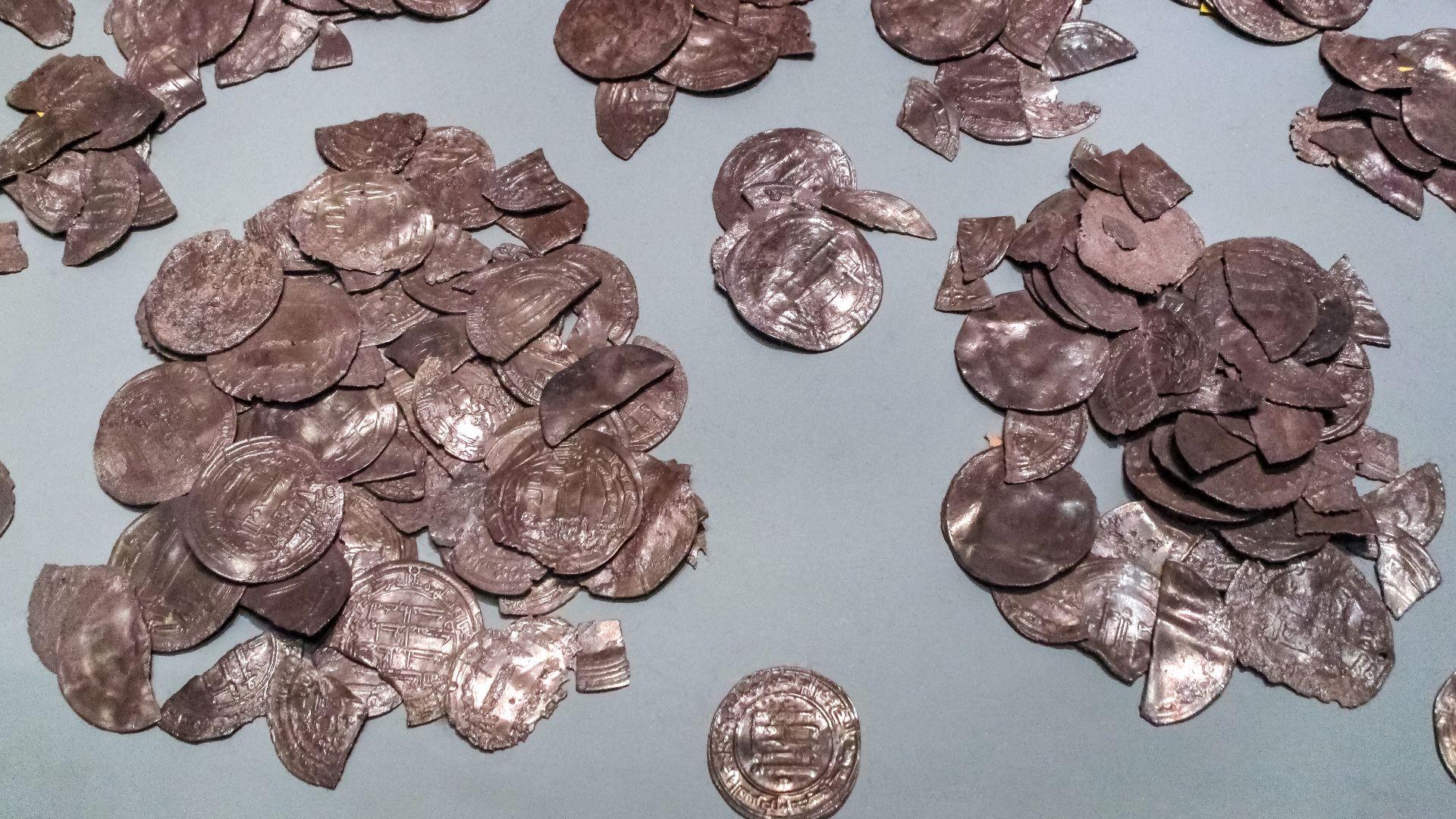 Closeup of silver coins from hoard No 2 of the Spillings Hoard at Gotland Museum, Visby, Gotland, Sweden.