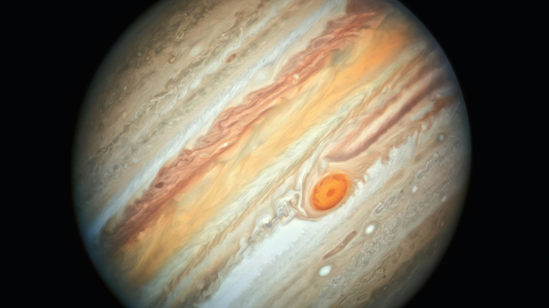 the planet is shown in a dark background