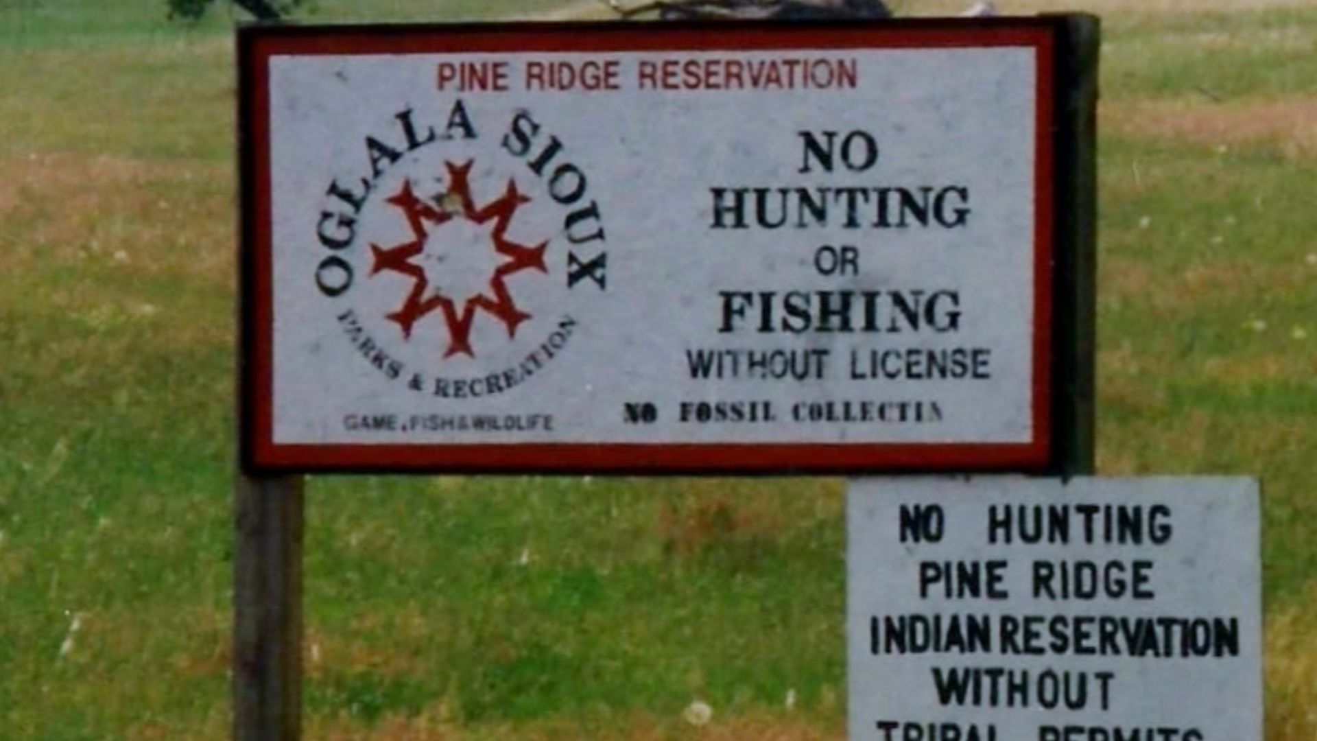 Sign with ”No hunting and fishing” in Pine Ridge Indian Reservation, South Dakota, without a license from the Oglala Sioux tribe
