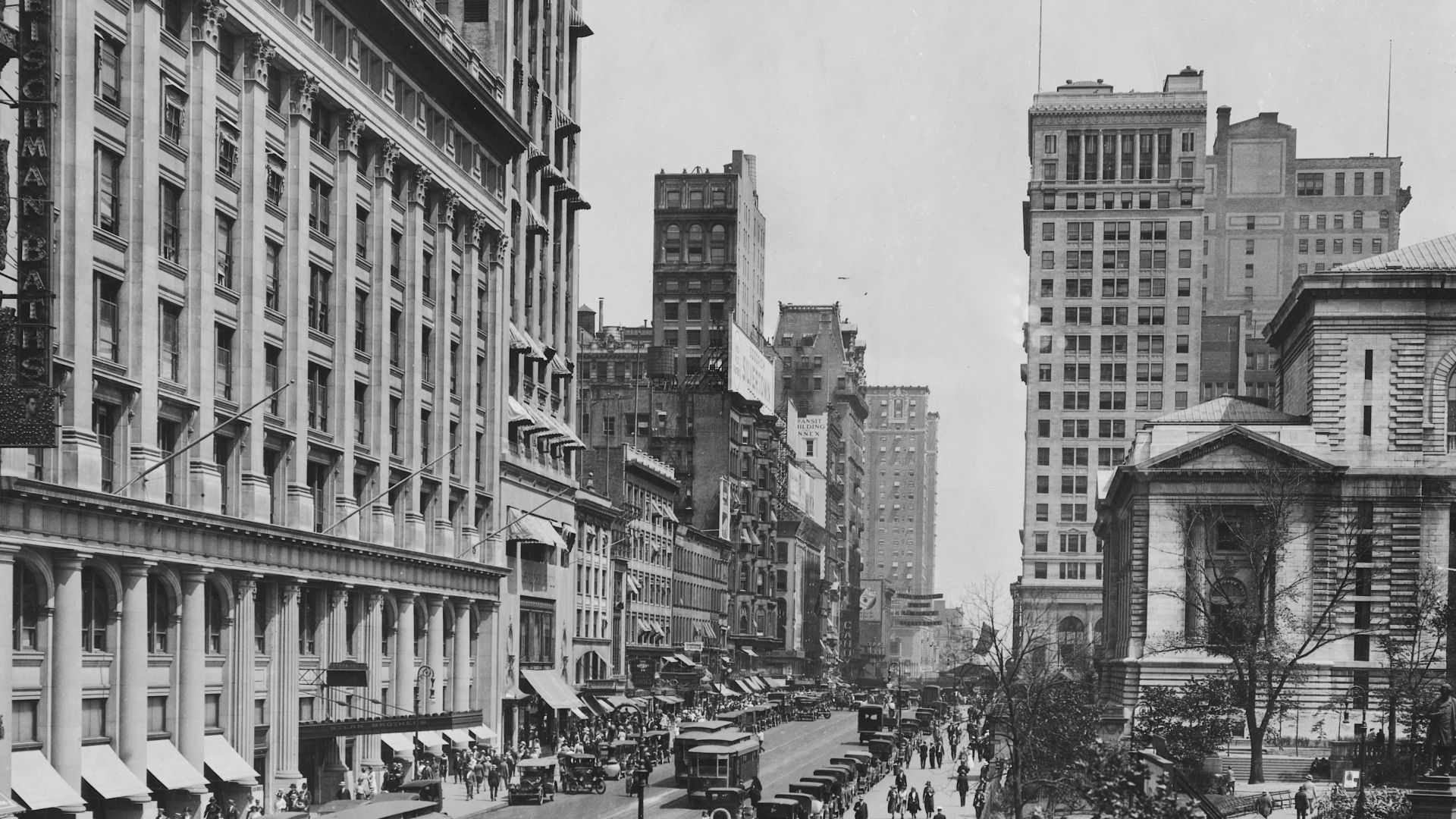 42nd Street, view east from 6th Avenue, Manhattan. The large building at left is Stern Brothers' department store, opened in 1913; the next building to the east is the Aeolian Company building, with Aeolian Hall. At right is the Schwarzman Building of the