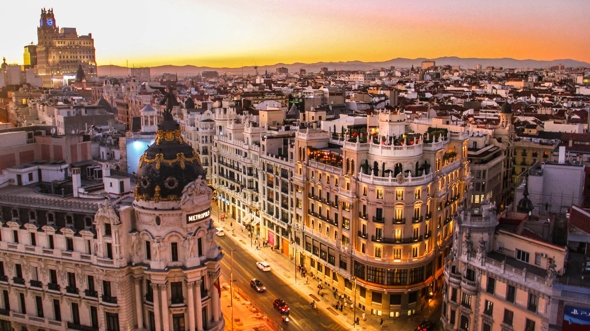 An aerial view of the Metropolis building and Gran Via in Madrid at low sun