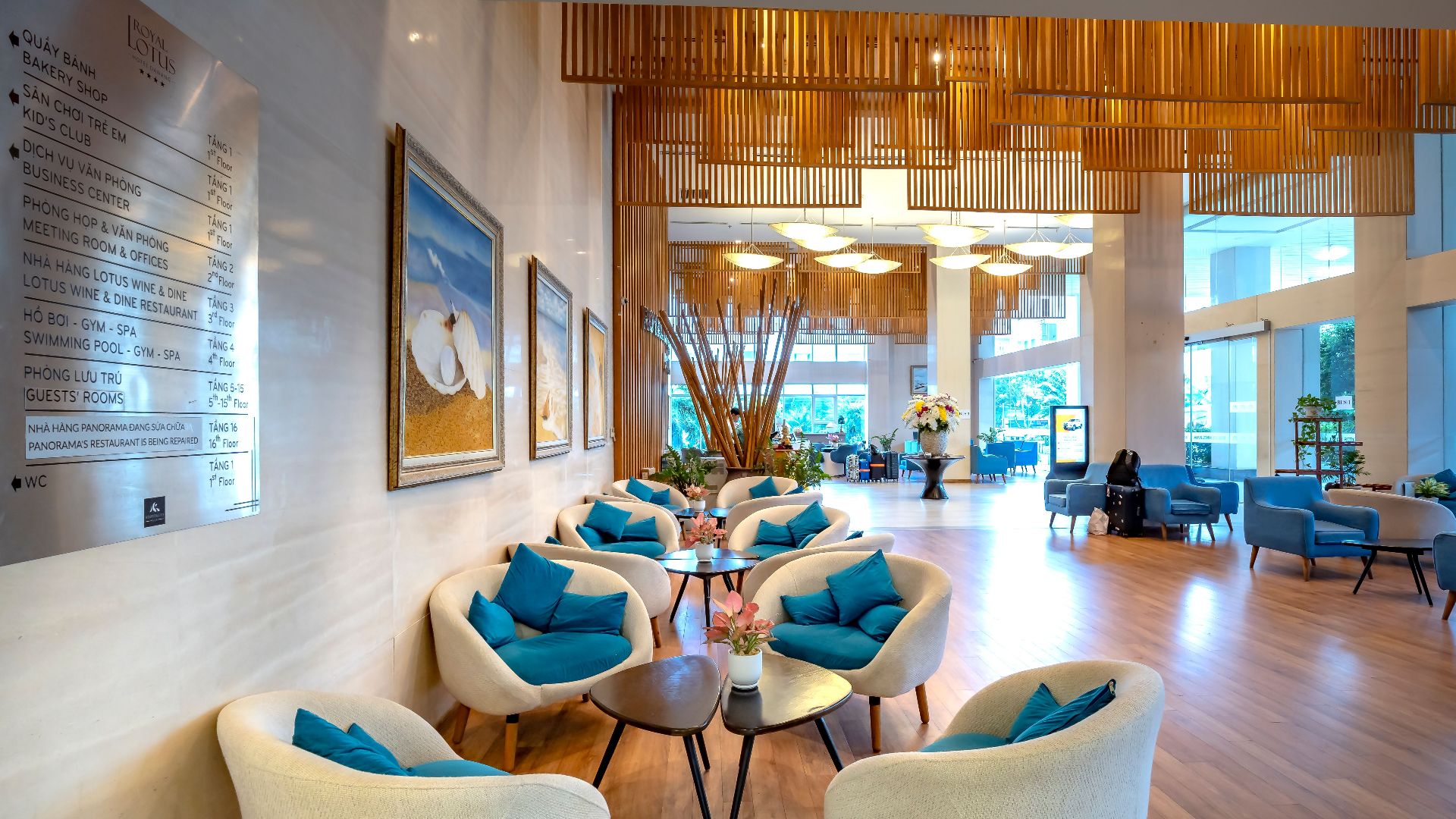 Spacious hotel lobby featuring stylish seating and contemporary decor with natural light.