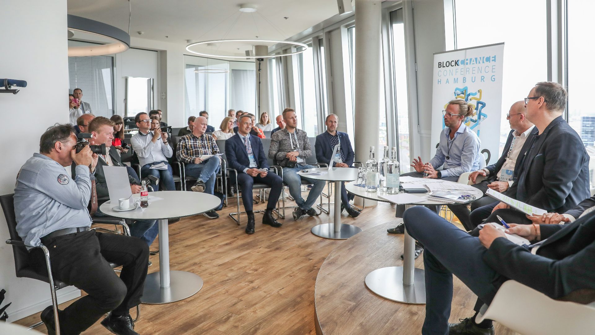 people sitting on chair in conference room