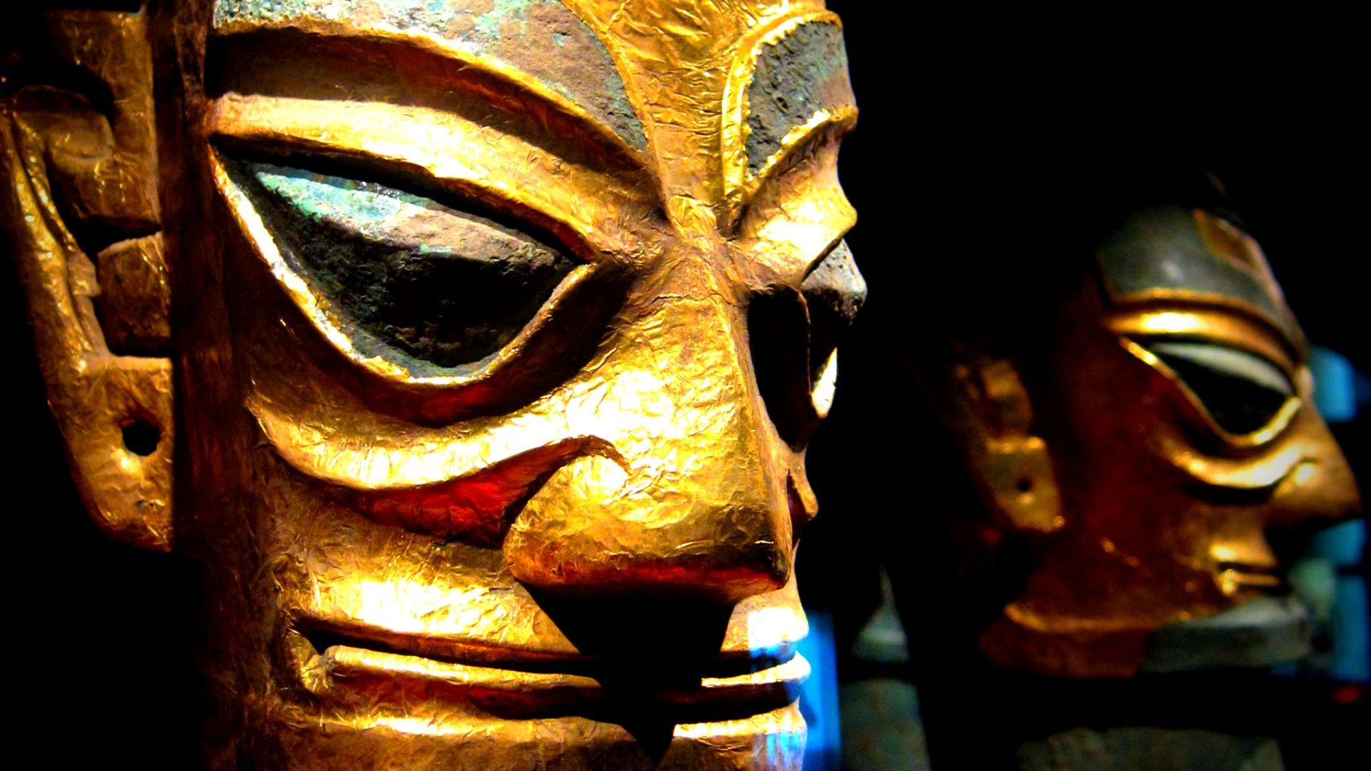 Sanxingdui bronze head wearing a gold foil mask.