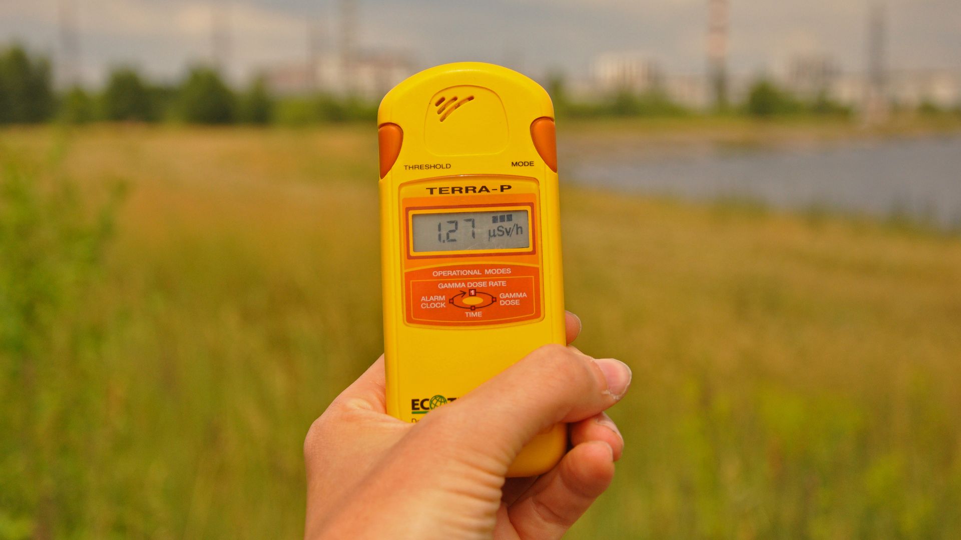Dosimeter is a tool that measures radiation. In this image the photographer is in the Chernobyl Exclusion Zone using this tool to convey how the land is still poisoned by radiation to this day.