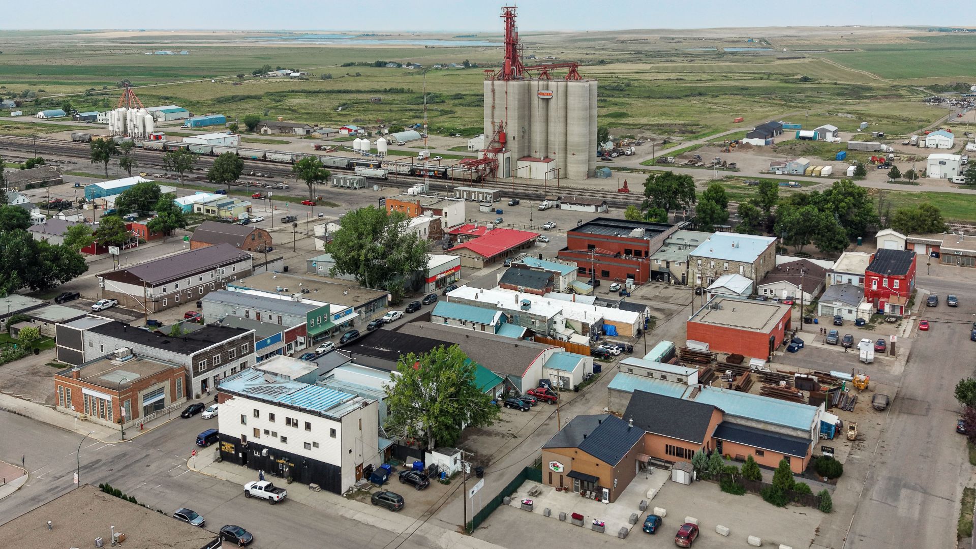 Aerial view of downtown Maple Creek, Saskatchewan, a town of 2,176 residents known for its ranching heritage and proximity to Cypress Hills Interprovincial Park.