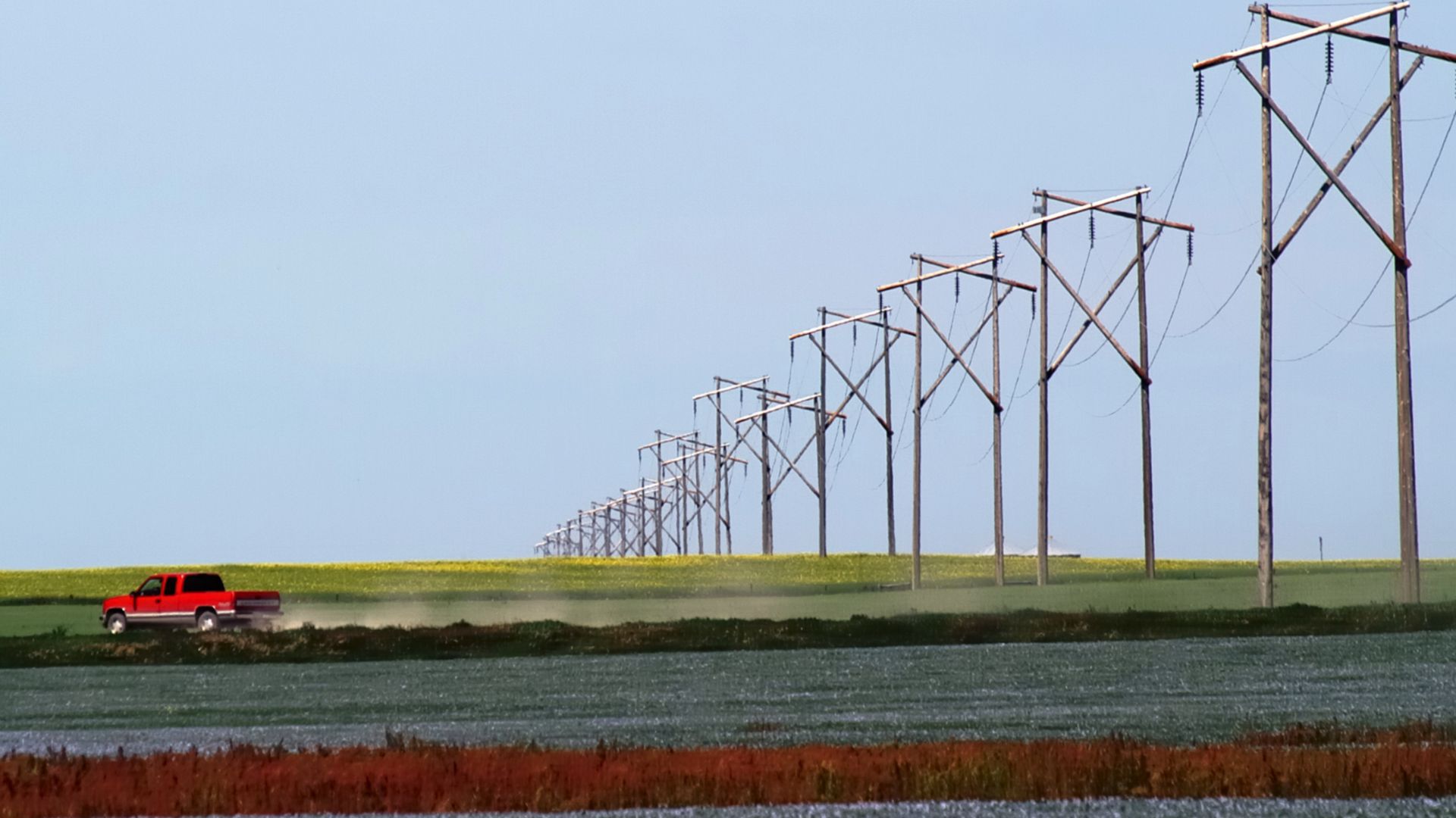 Fields of Canola and Flax on the Saskatchewan Prairie.