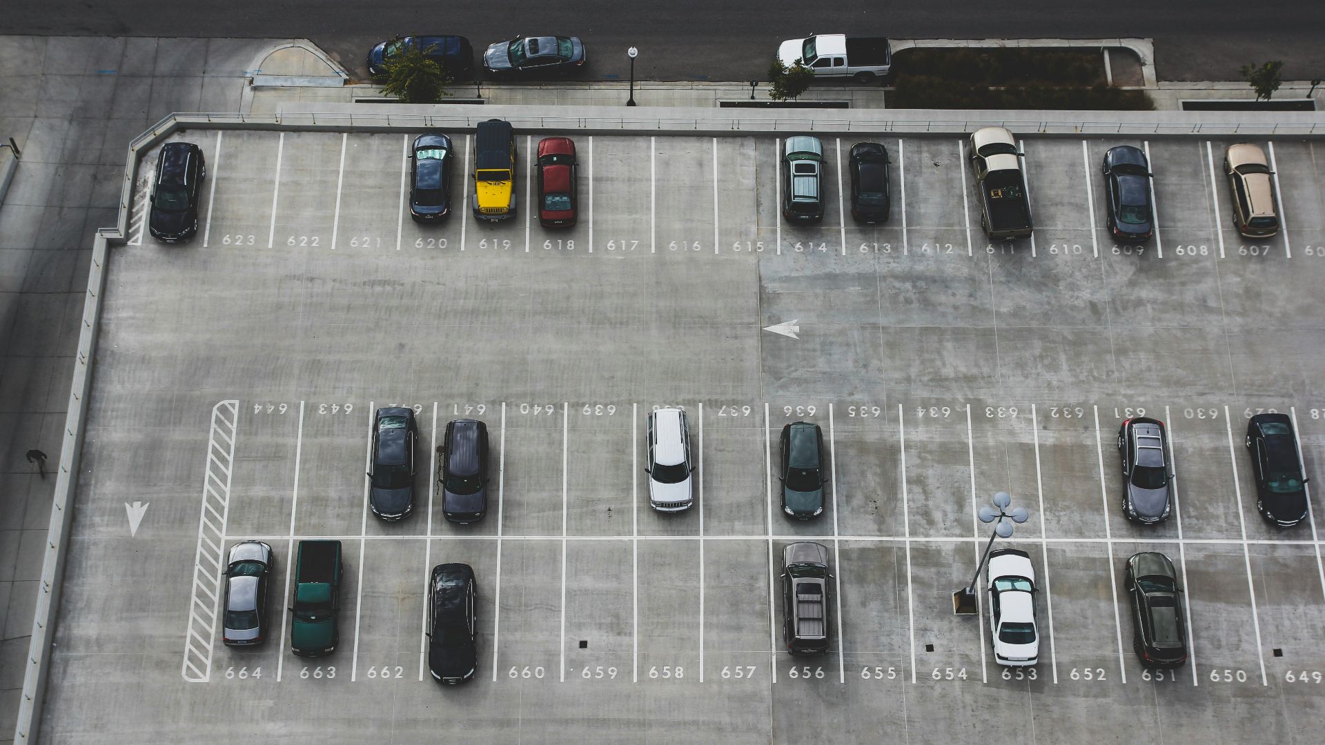 aerial view of cars parked on parking lot