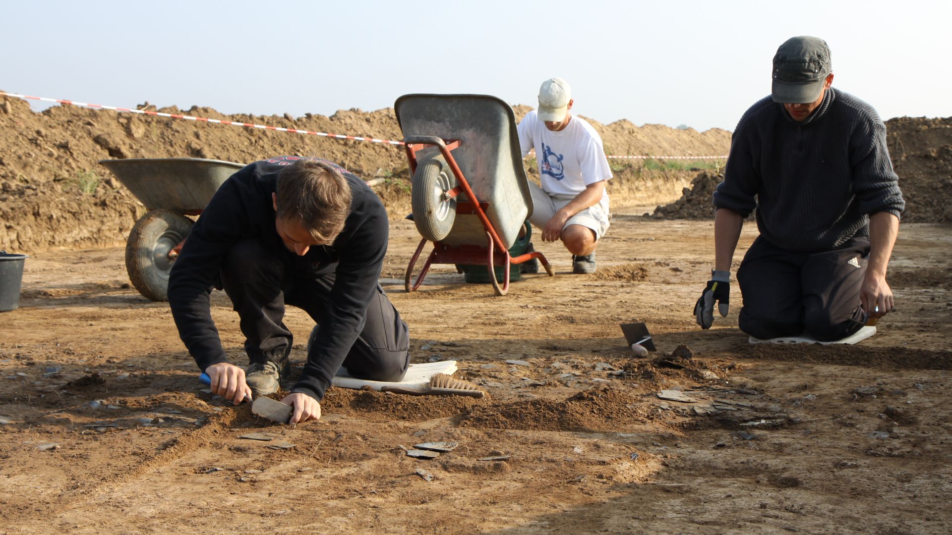 Students from the University of Mainz take part in an archeological dig for Roman artifacts and ruins Sept. 22, 2009, during foundation work at a new townhouse project site at the southern end of the Wiesbaden Army Airfield in Germany. The excavation effo
