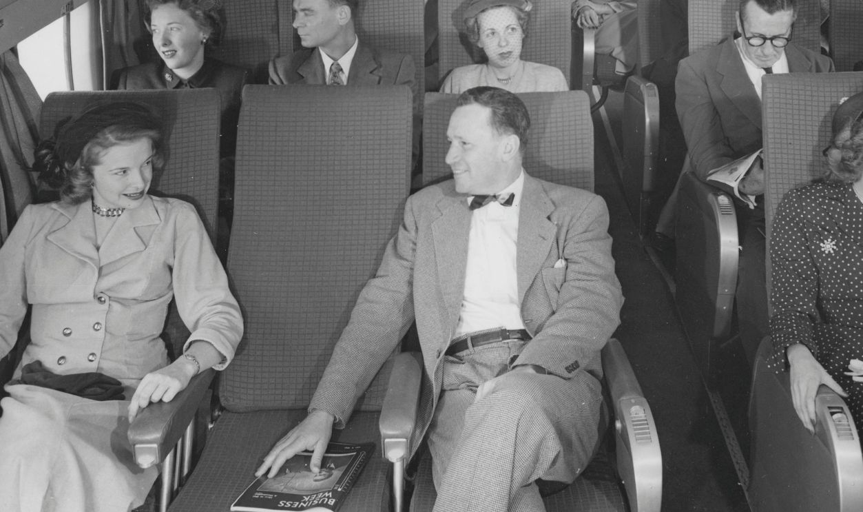 Interior from a plane belonging to the American airline Pan American with passengers in the 1950s 