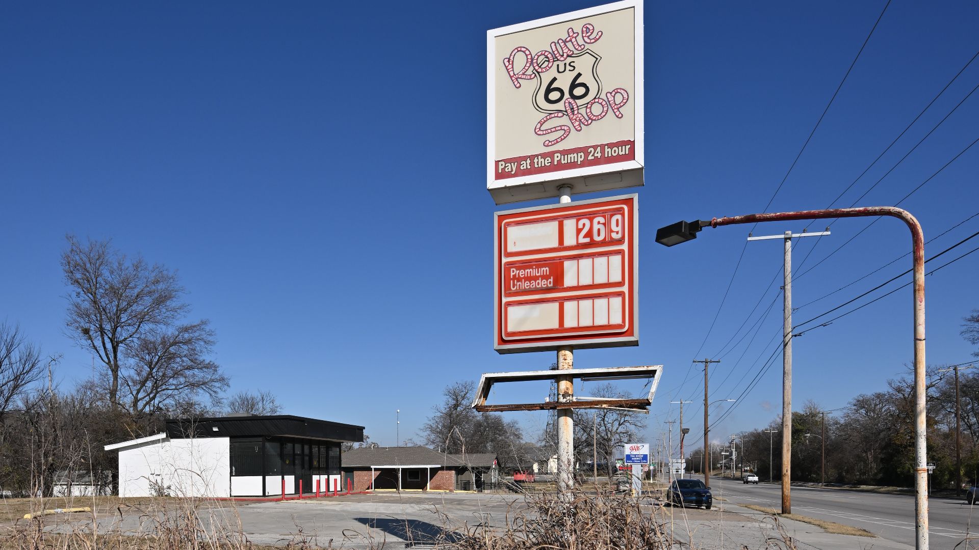 The site of a former gas station, Route 66 Shop advertising