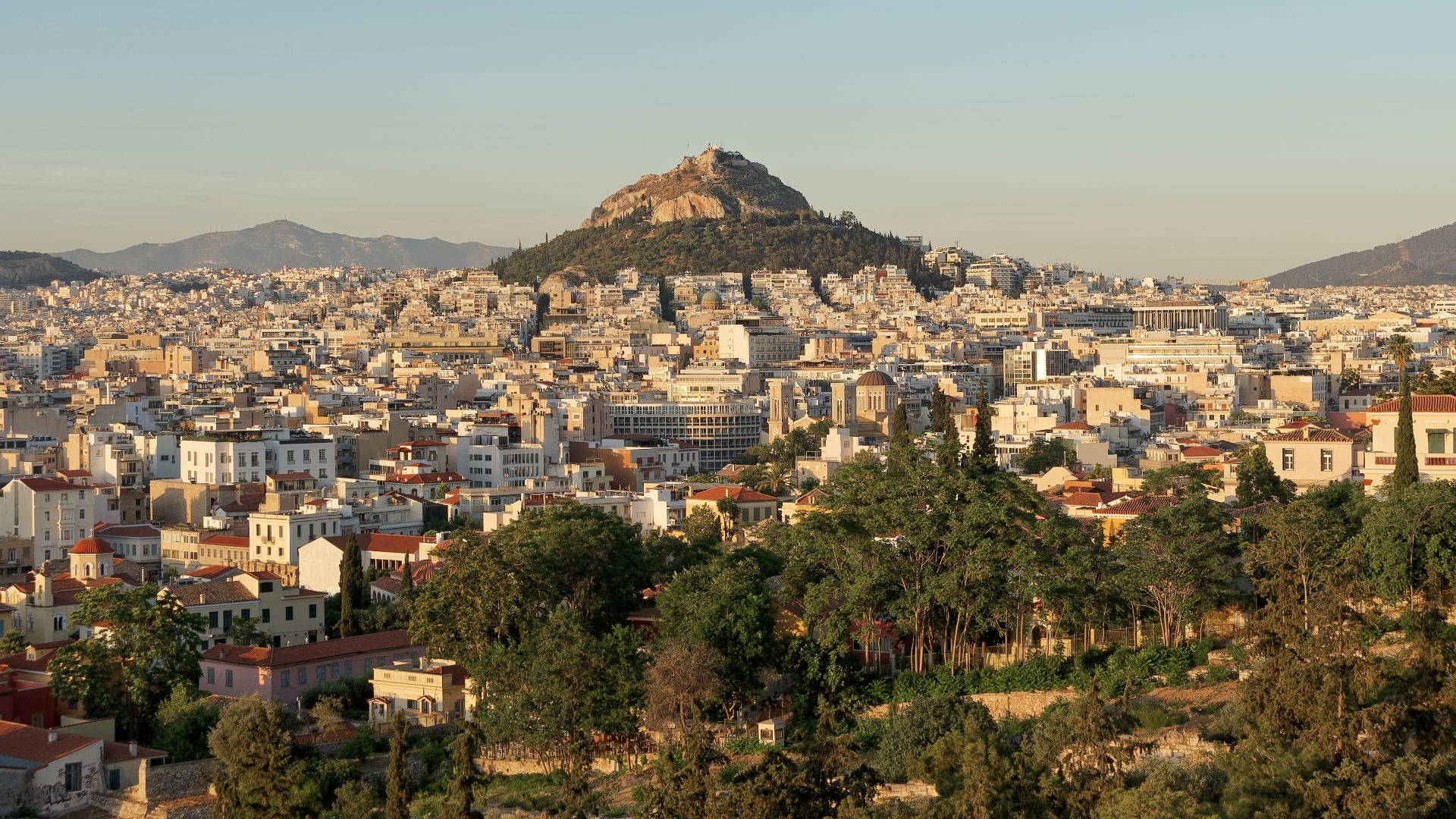 View of Athens with the Lycabettus Hill from Areopagus before sunset