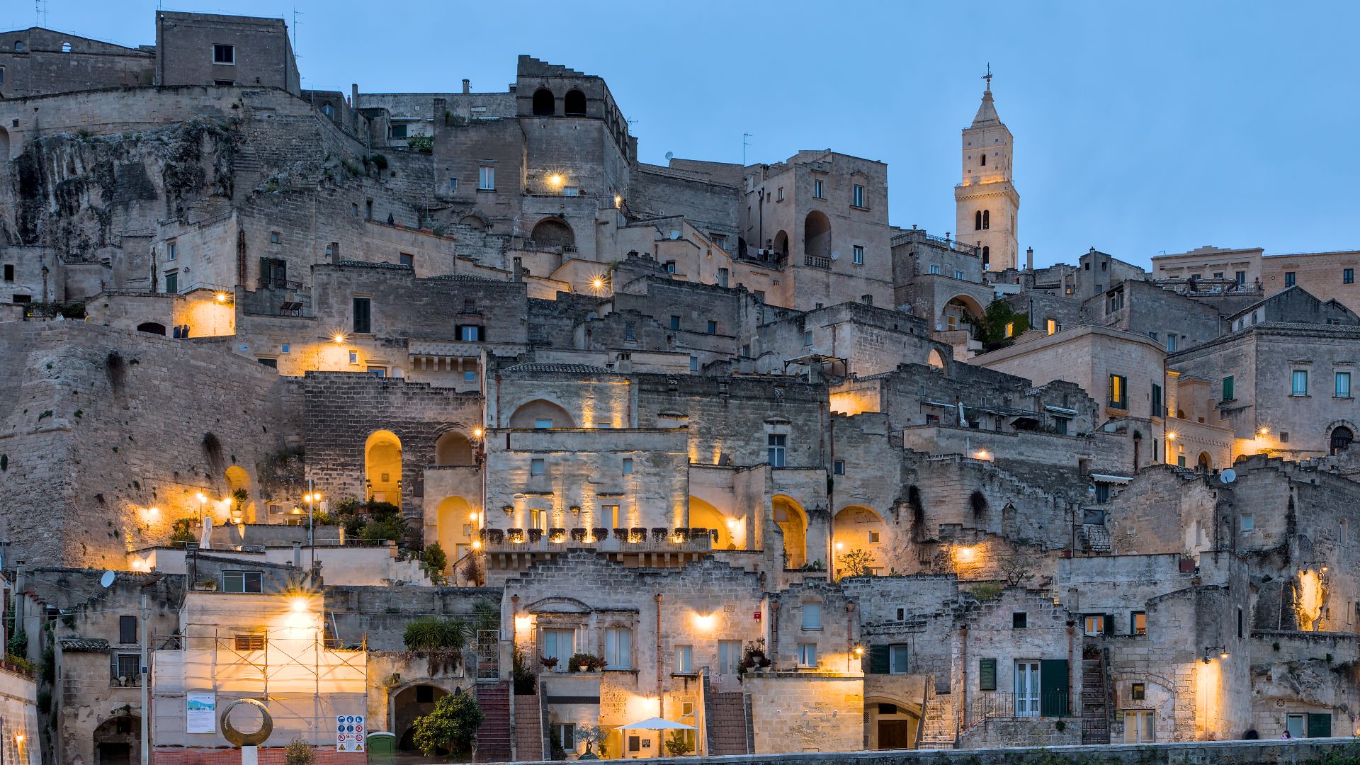 Matera (Basilicata, Italy) - View of Sasso Barisano from piazza San Pietro Caveoso, right after sunset