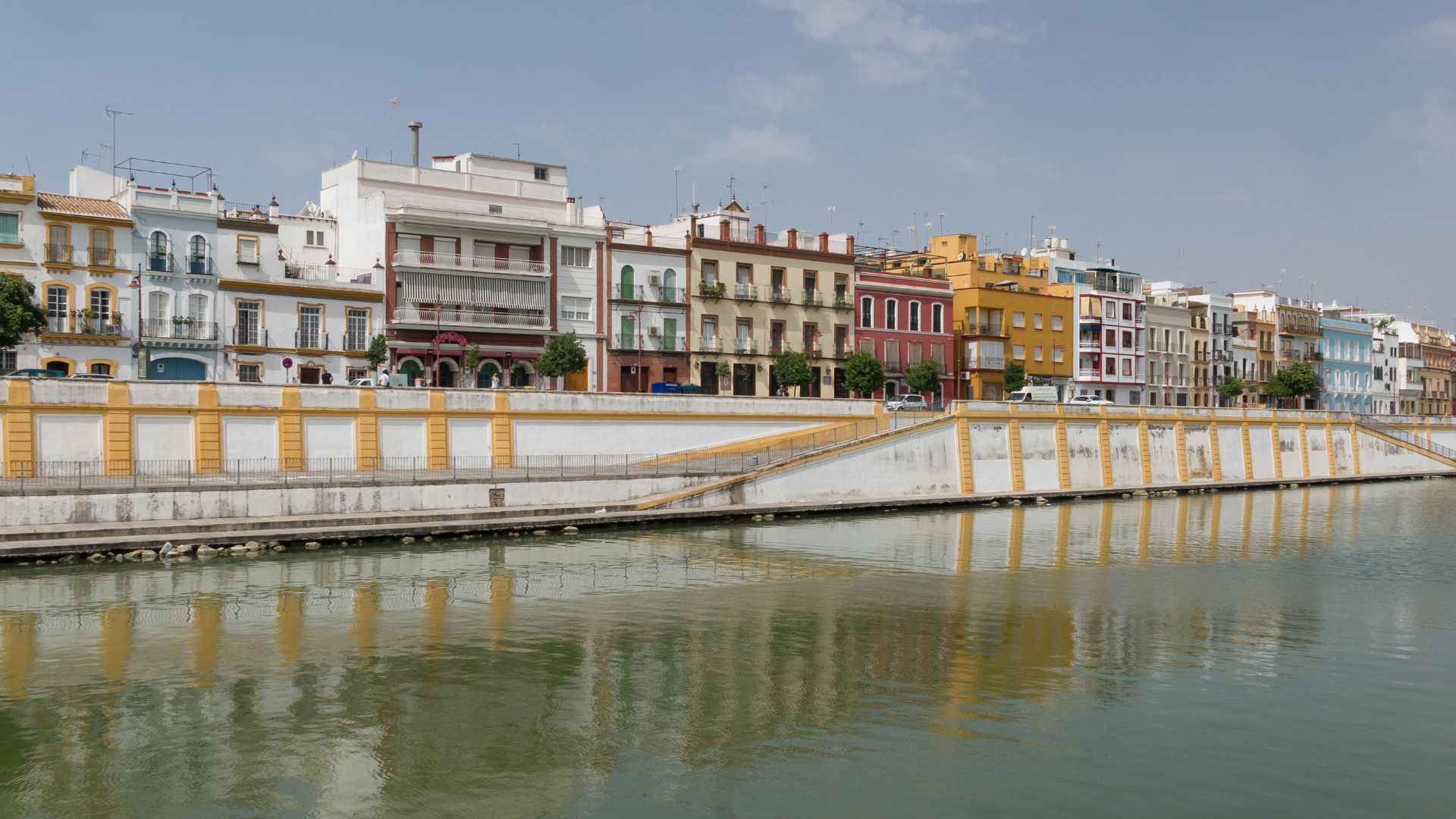 The embankment of the Triana neighborhood, as seen from a boat on the Guadalquivir river, Seville, Spain.