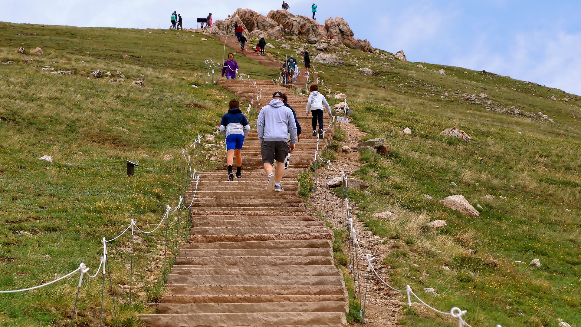 Walking the Alpine Ridge Trail in Rocky Mountain National Park, Colorado, United States. It's about 235 steps to the top.