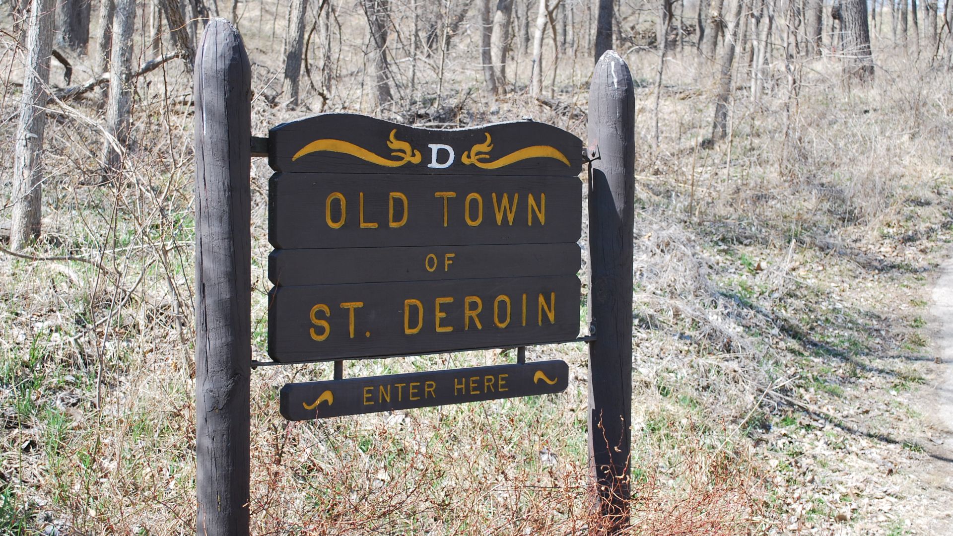 Sign on the path approaching the St. Deroin town site at Indian Cave State Park in southeastern Nebraska.