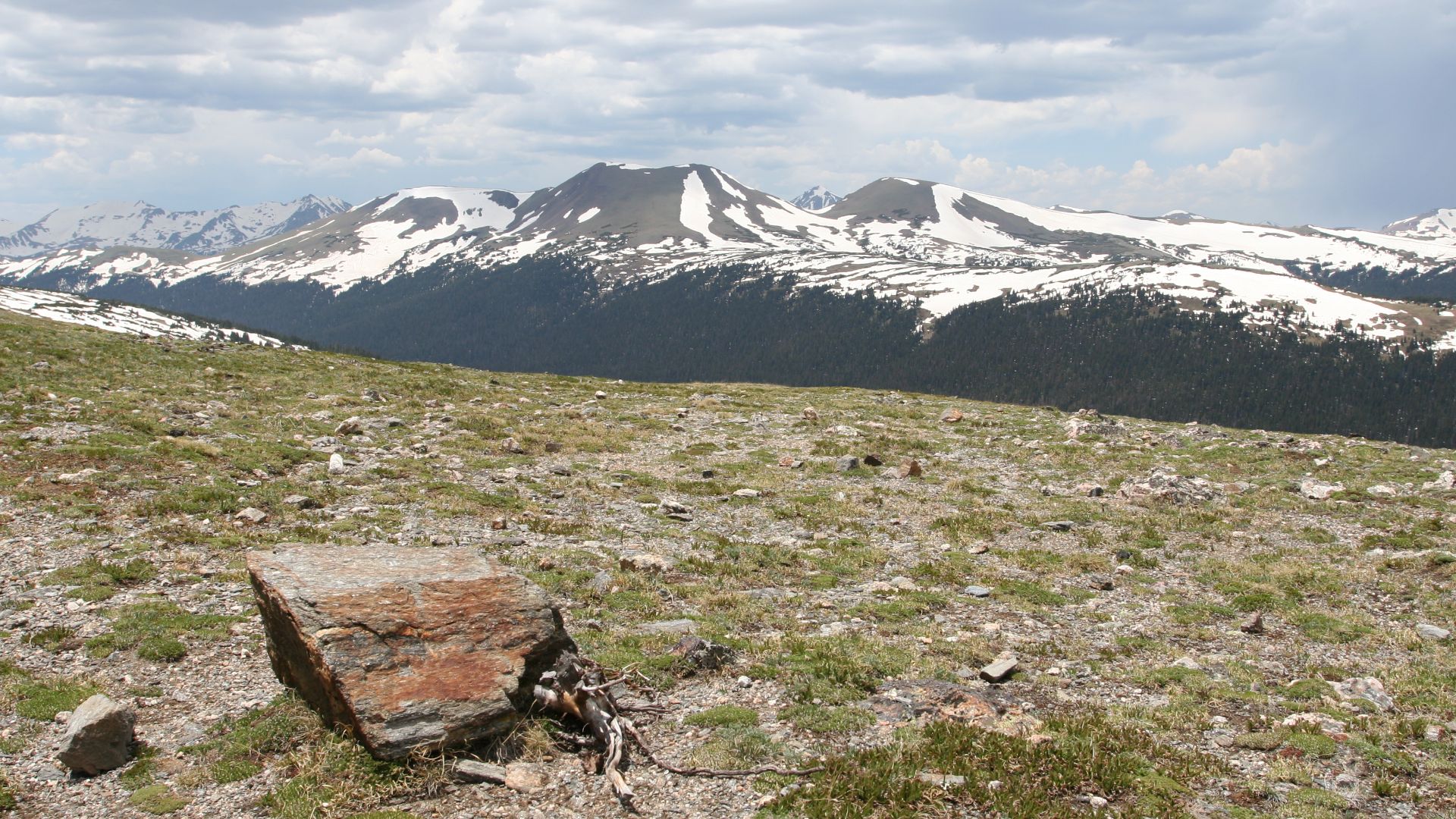 A photograph taken of a tundra landscape high in the Rocky Mountains National Park.