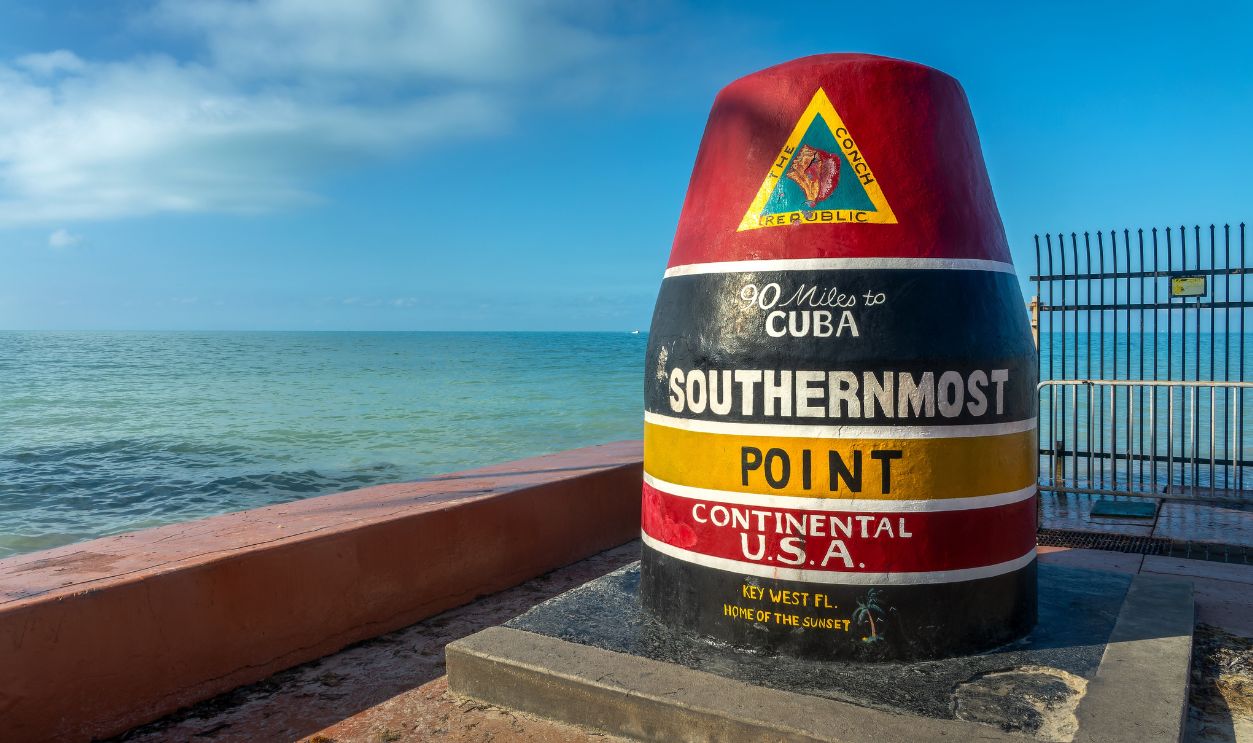 KEY WEST, FLORIDA - MARCH 31: Southernmost Point, 90 miles from Cuba, famous concrete buoy on March 31, 2025 in Key West, Florida